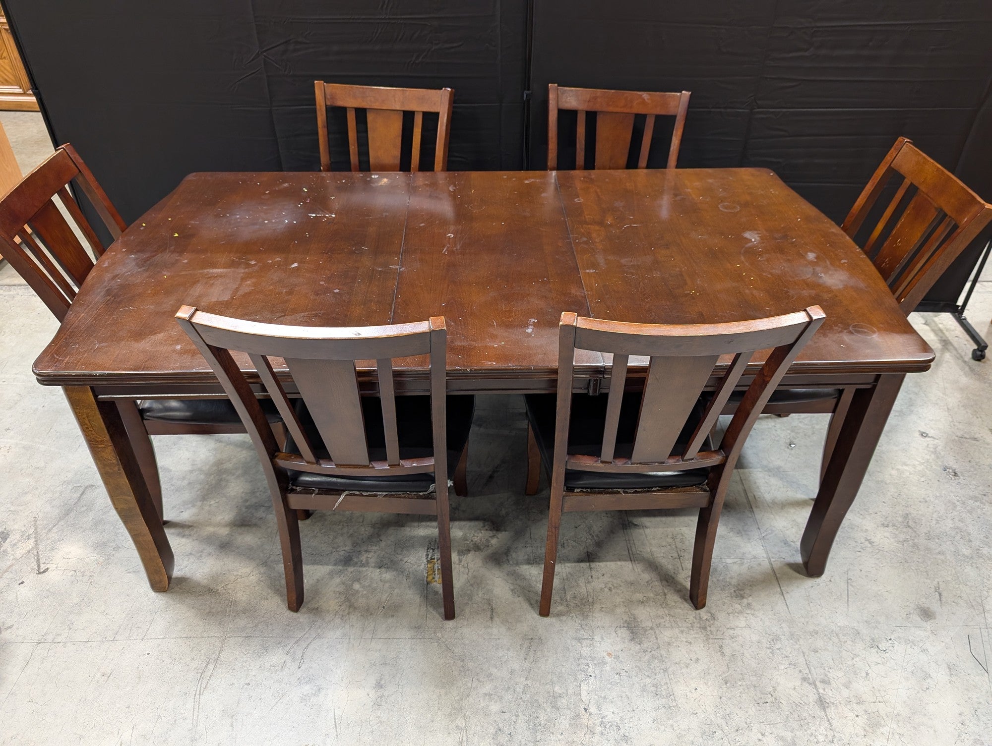 Used Dark Brown Wood Dining Table with Six Slat Back Chairs