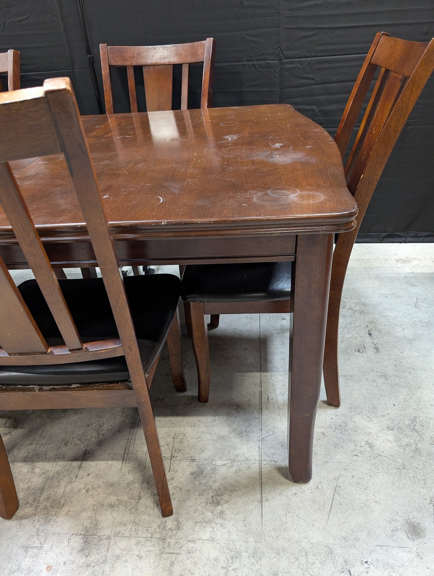 Used Dark Brown Wood Dining Table with Six Slat Back Chairs
