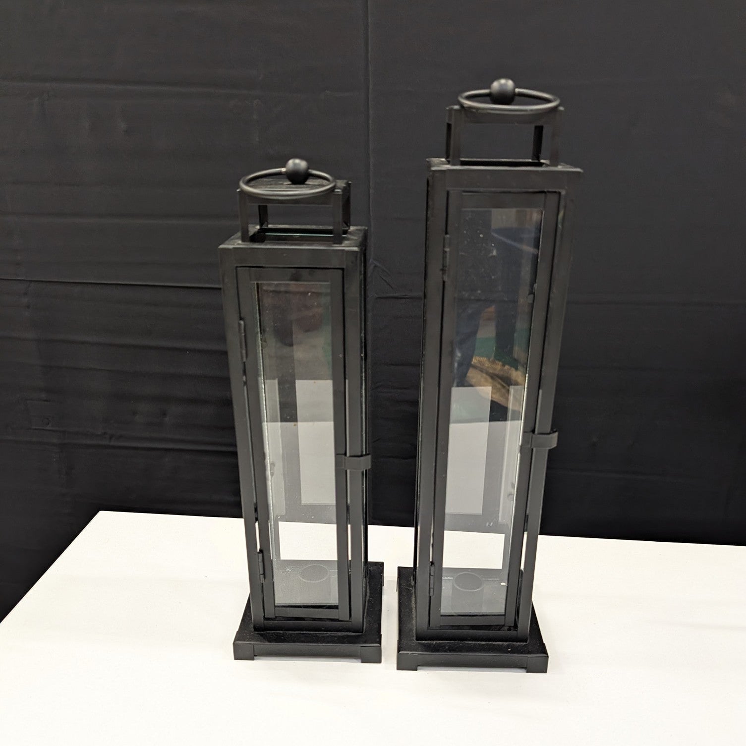 Set of Two Black Metal and Glass Pillar Candle Lanterns