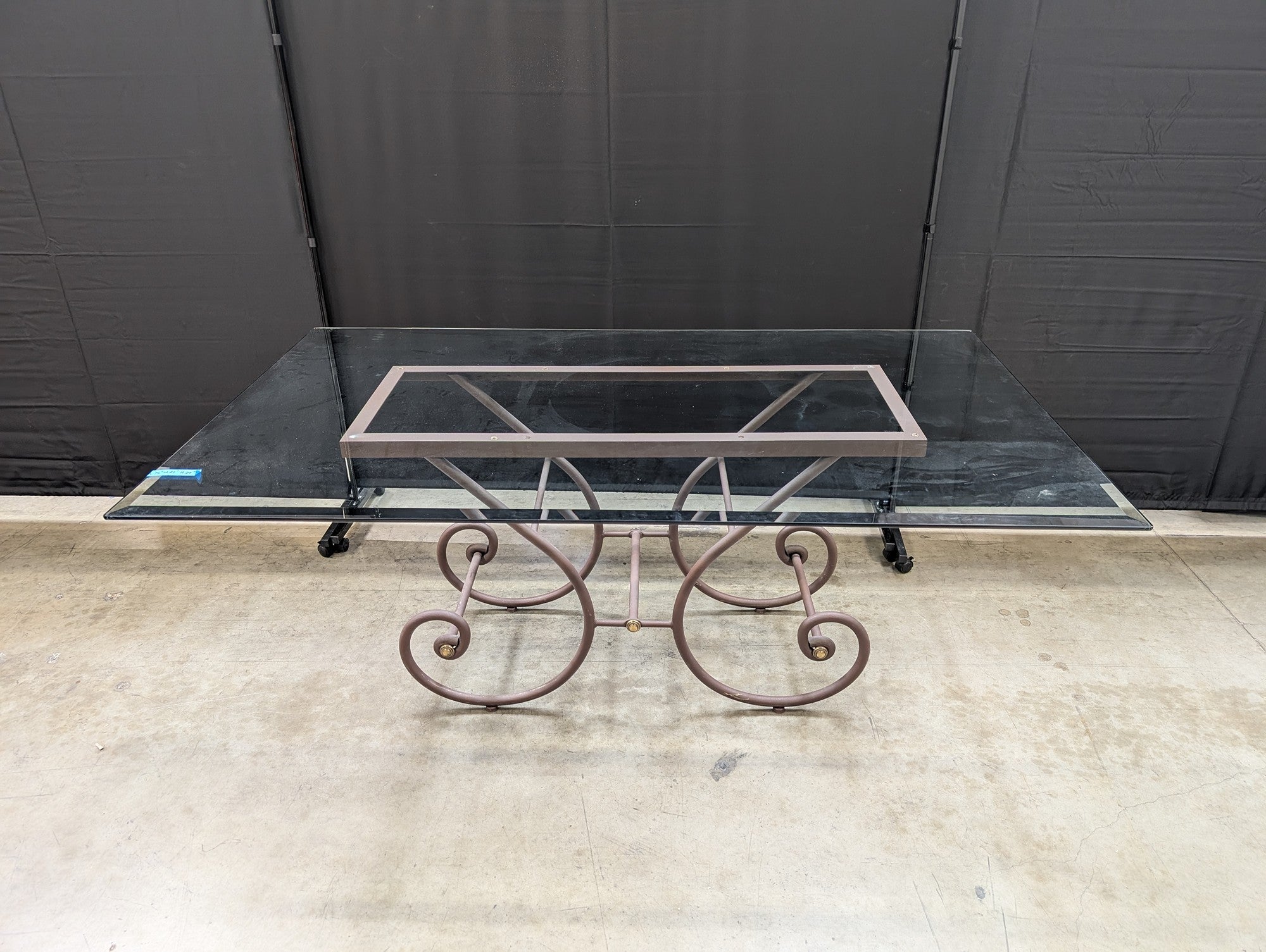 Grand Scrolled Metal Base Glass Top Dining Table