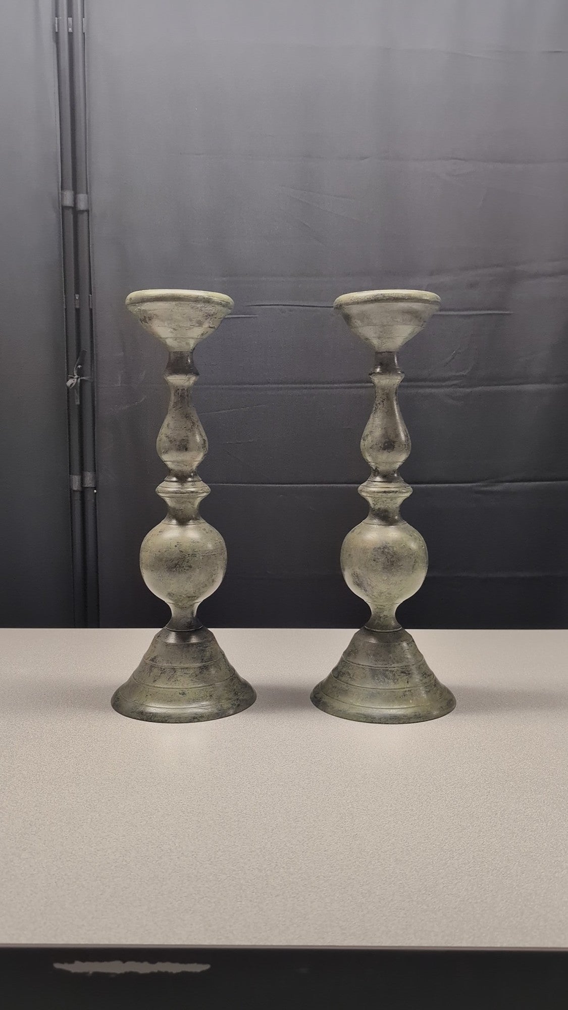 Pair of Distressed Metal Baluster Candlestick Holders