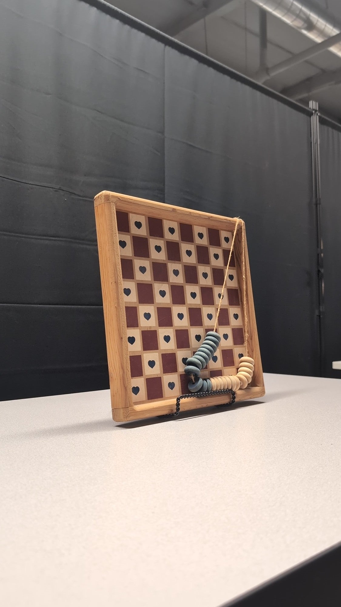 Rustic Wood Heart Pattern Strategy Game with Beaded Pieces