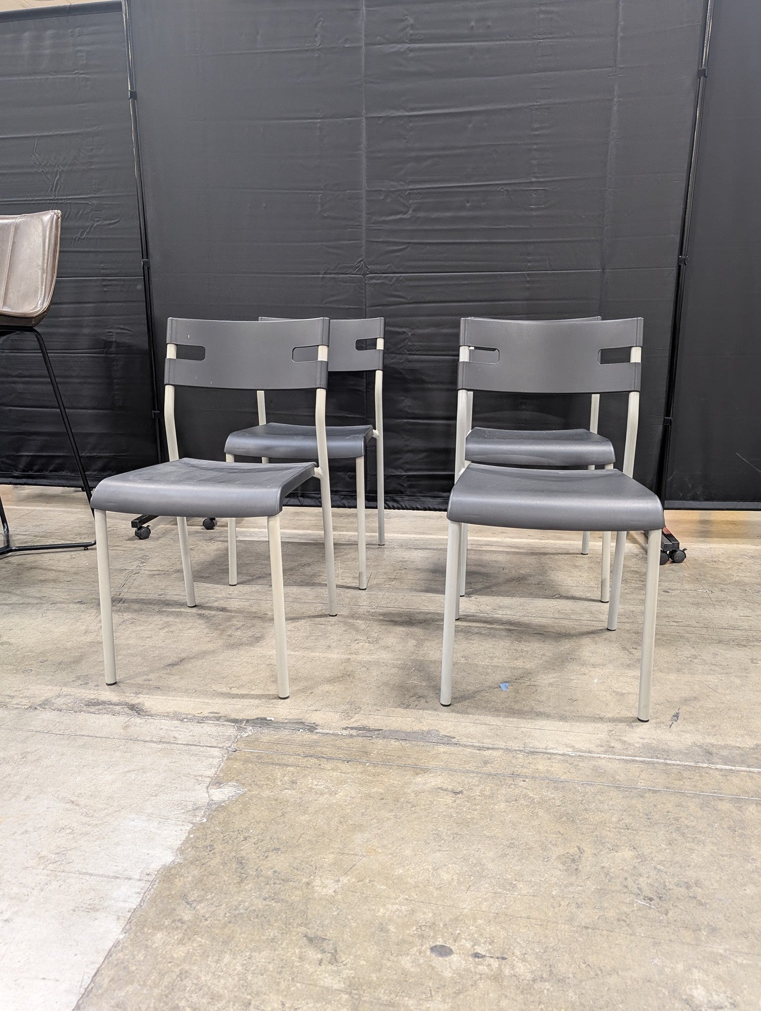 Modern Grey Plastic Stacking Chair with Light Metal Frame