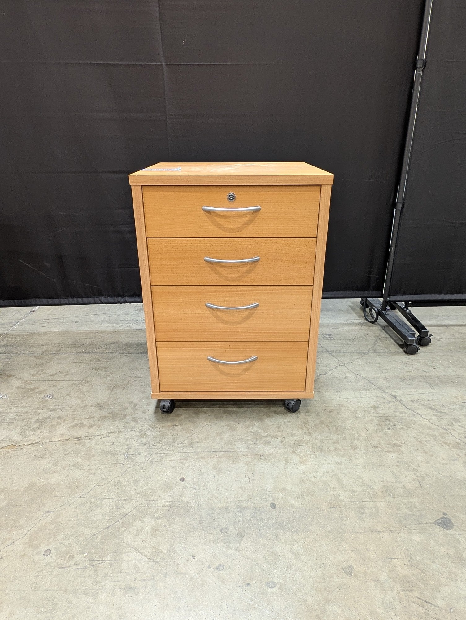 Mobile Light Wood-Tone Four-Drawer Storage Cabinet