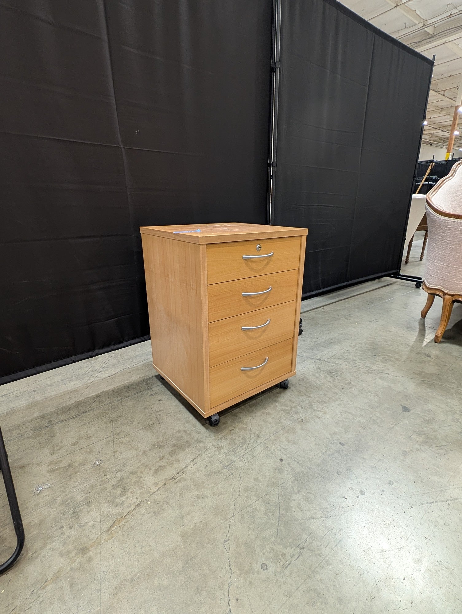 Mobile Light Wood-Tone Four-Drawer Storage Cabinet