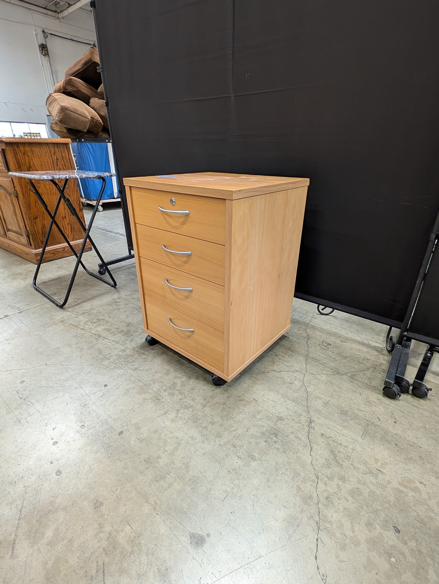 Mobile Light Wood-Tone Four-Drawer Storage Cabinet