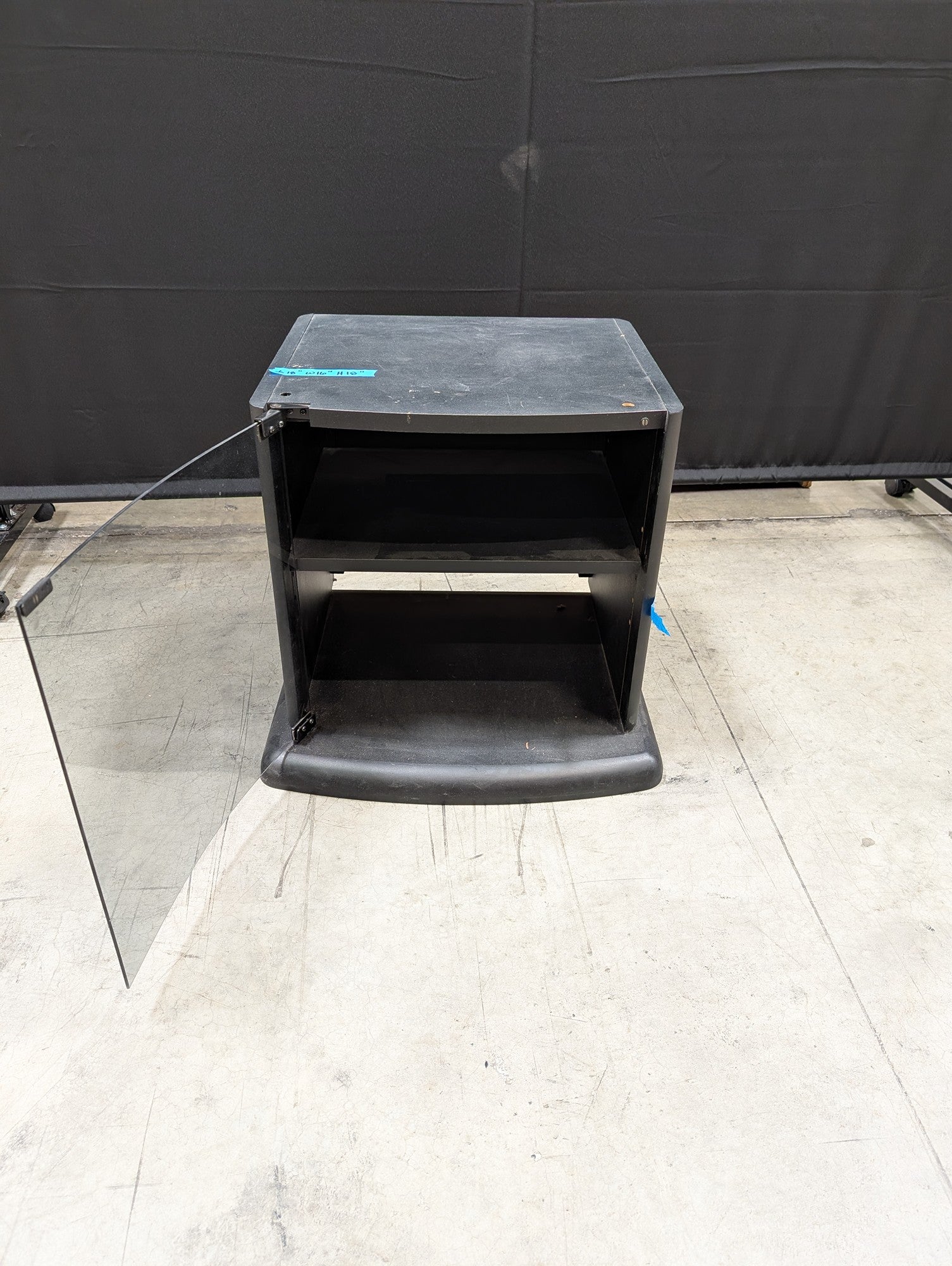 RCA Compact Black TV Stand with Glass Door and Shelves