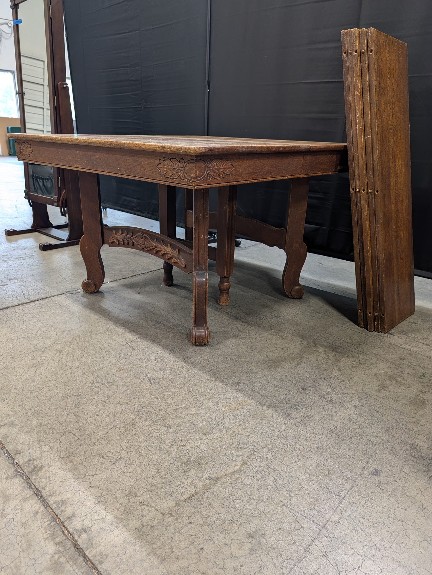 P. E. Routier Furniture Co. Carved Wood Extendable Dining Table