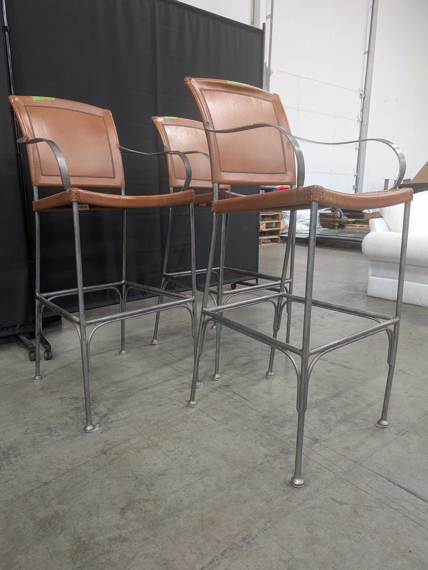Set of Three Tan Leather Bar Stools with Arms