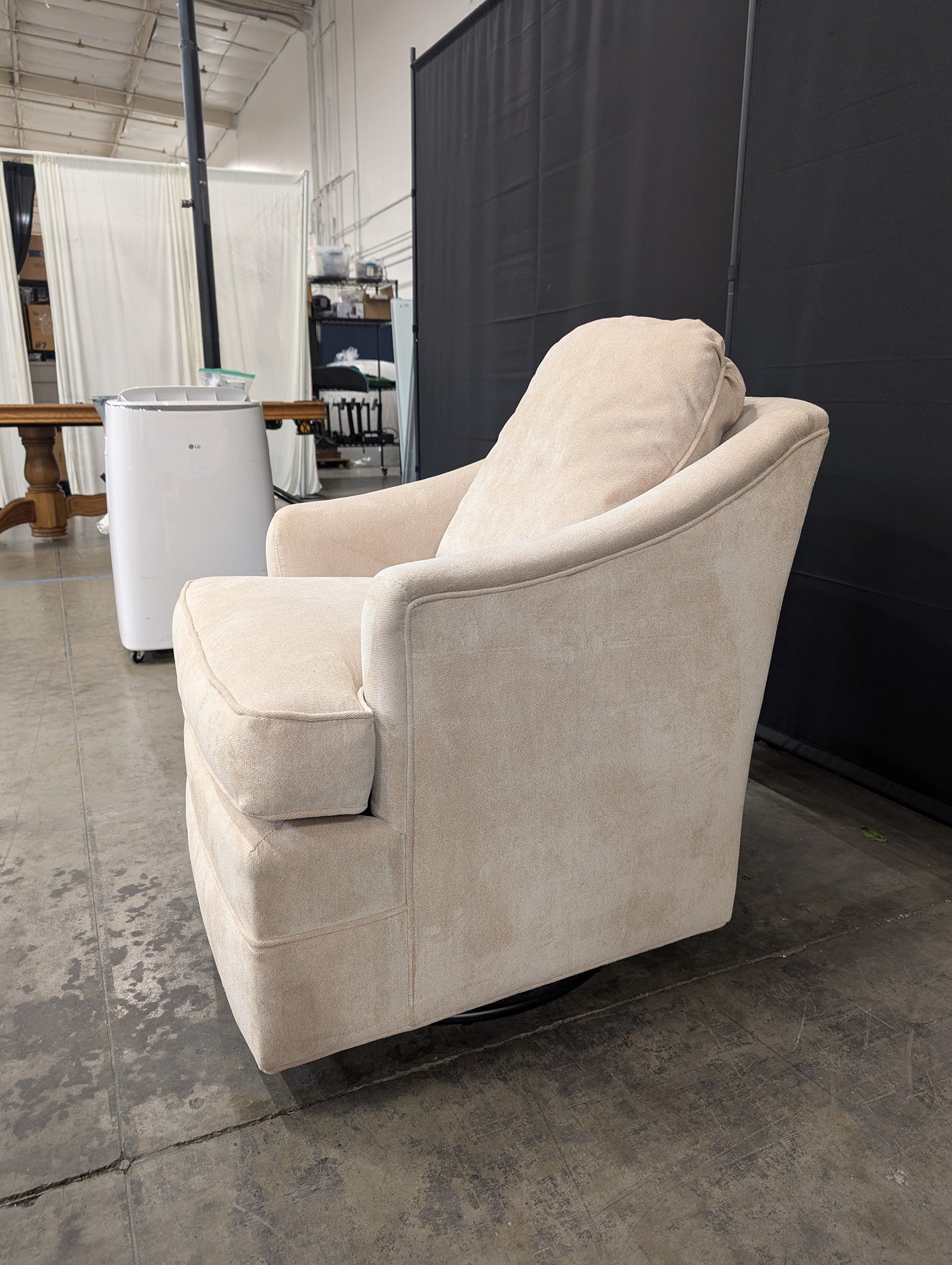 Cream Upholstered Swivel Accent Chair