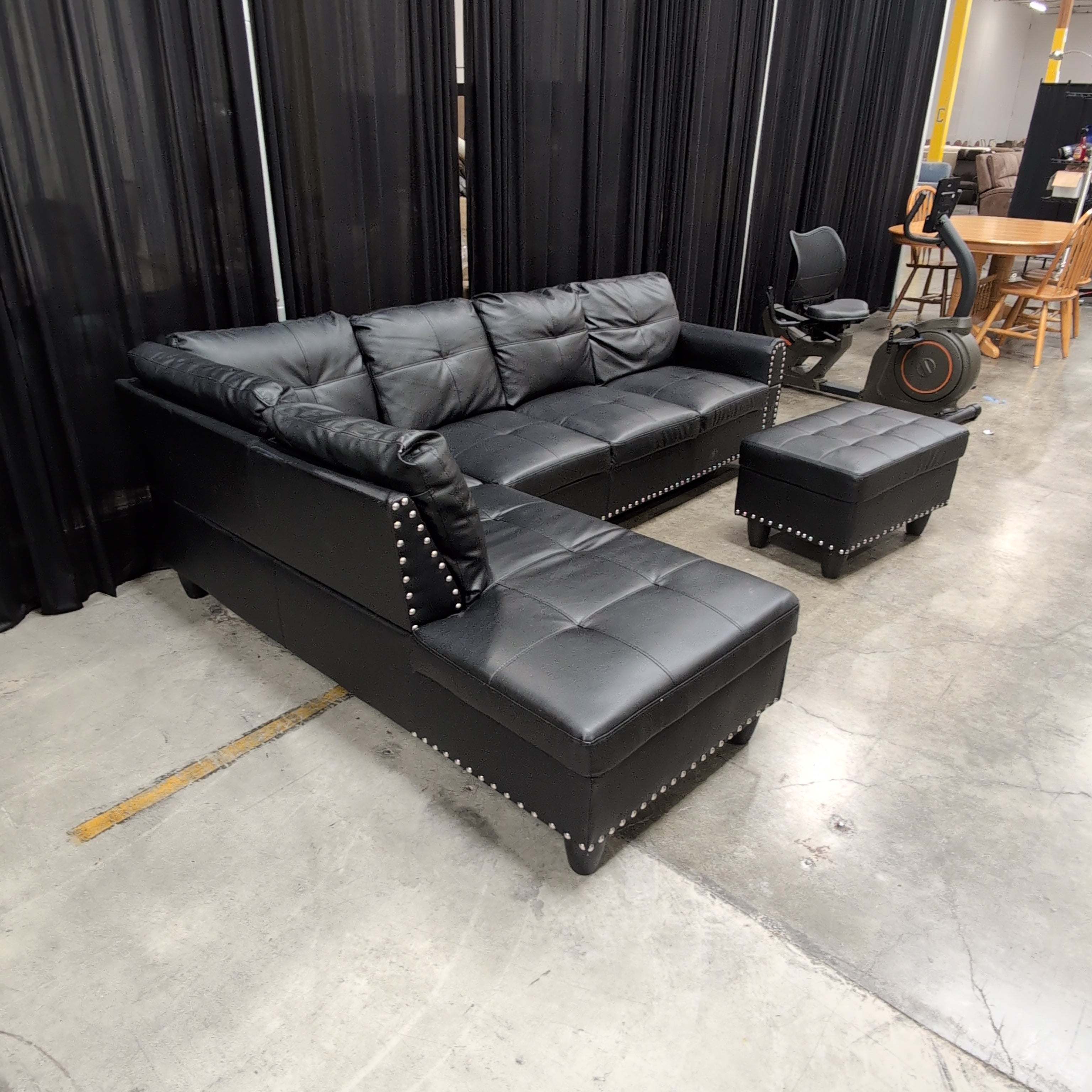 Black Faux Leather Sectional Couch with Ottoman