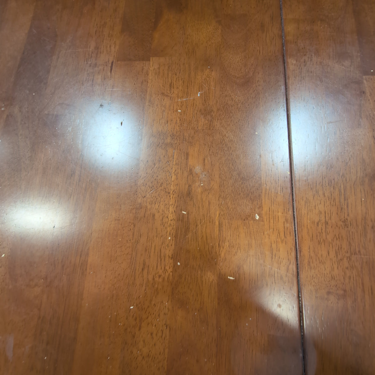 Two-Tone Extendable Dining Table with Pedestal Base