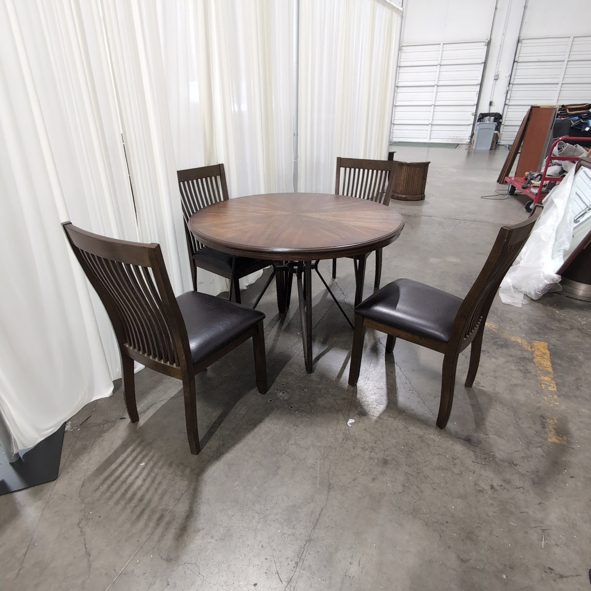 Round Dark Wood Dining Table with Sunburst Veneer