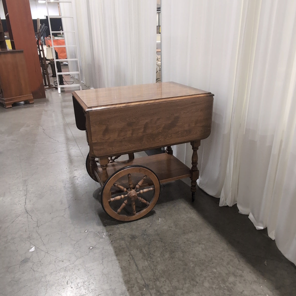 Light Brown Wood Drop Leaf Serving Cart with Turned Legs
