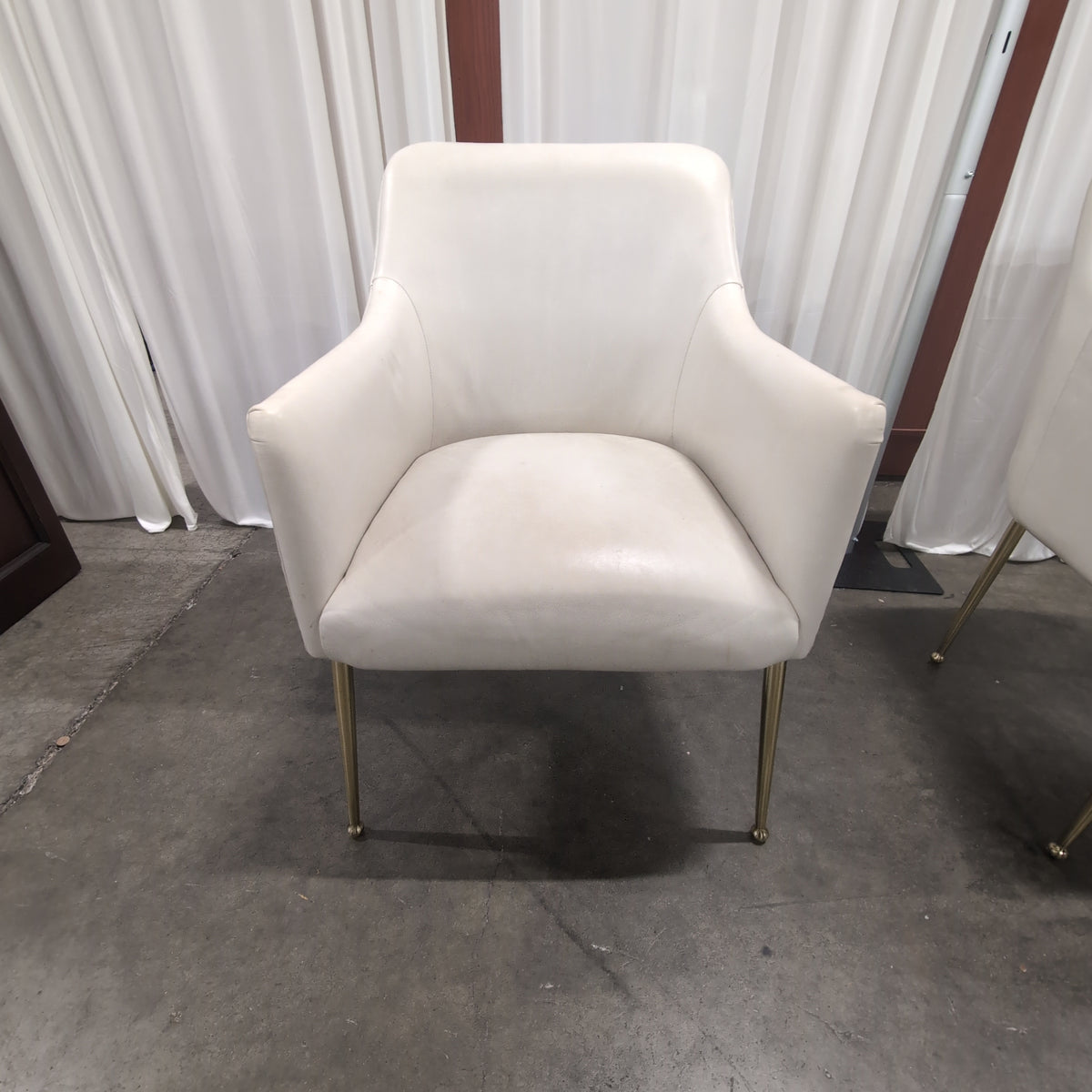 Pair of Antropologie Off-White Upholstered Arm Chair with Tapered Metal Legs