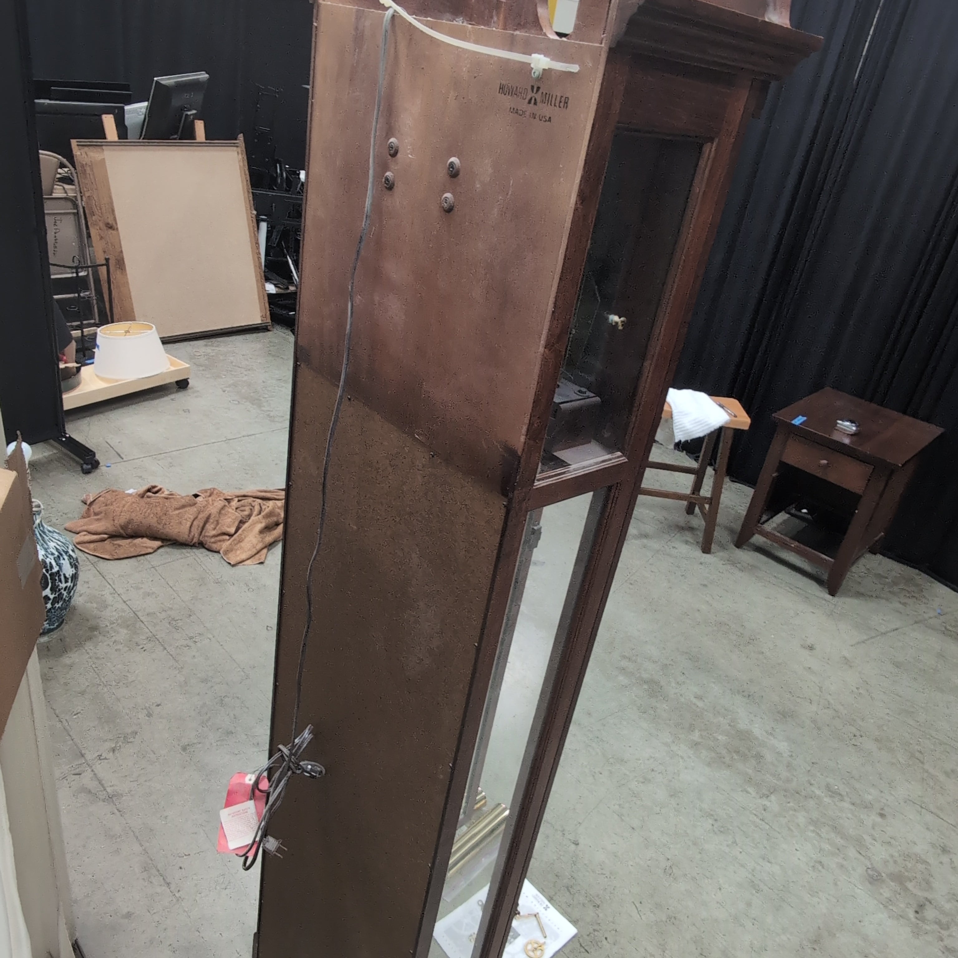 Howard Miller Decorative Wood Grandfather Clock with Brass Pendulum