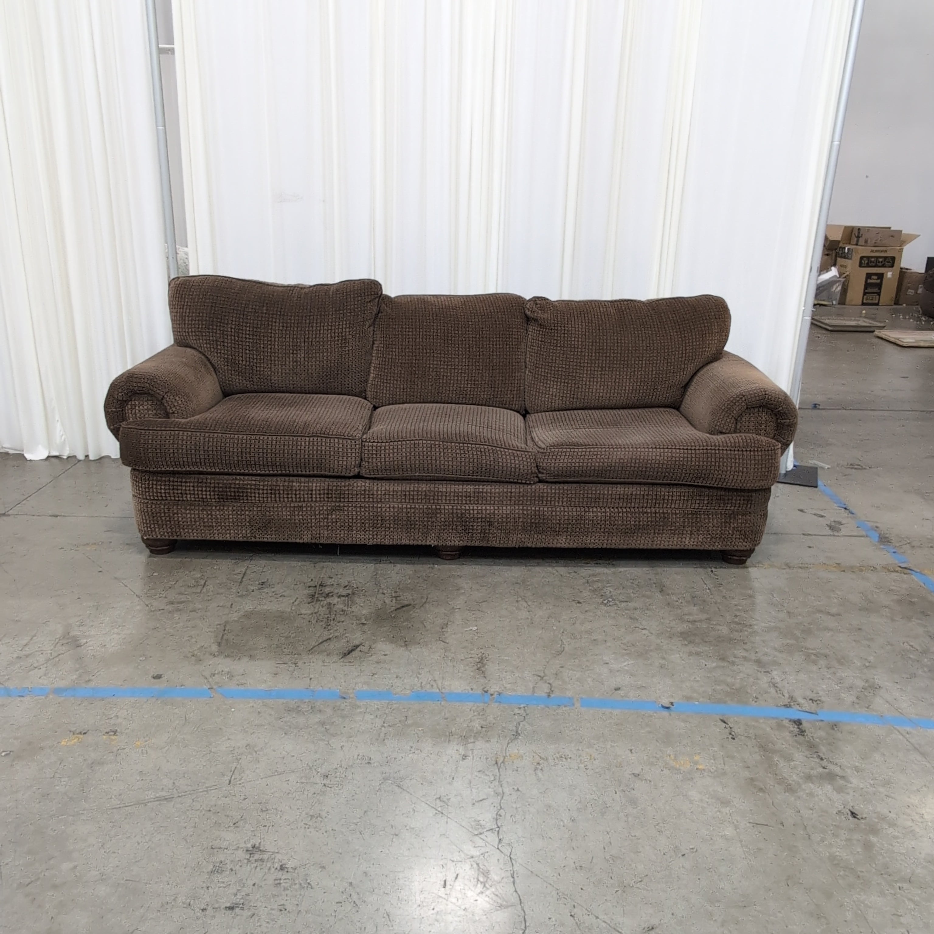 Brown Rolled Arm Three-Cushion Couch in Textured Fabric