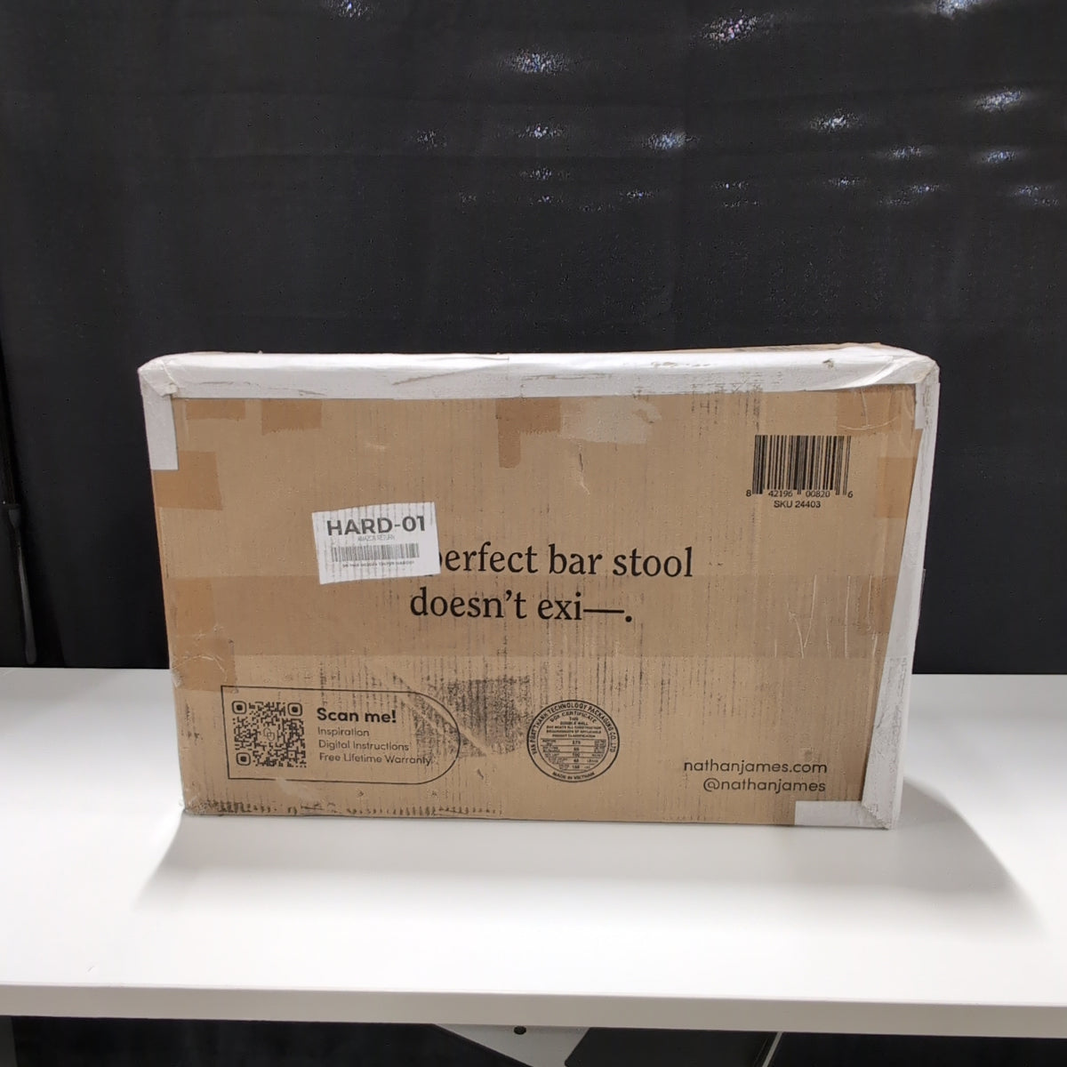 Unknown Item in Sealed Cardboard Box