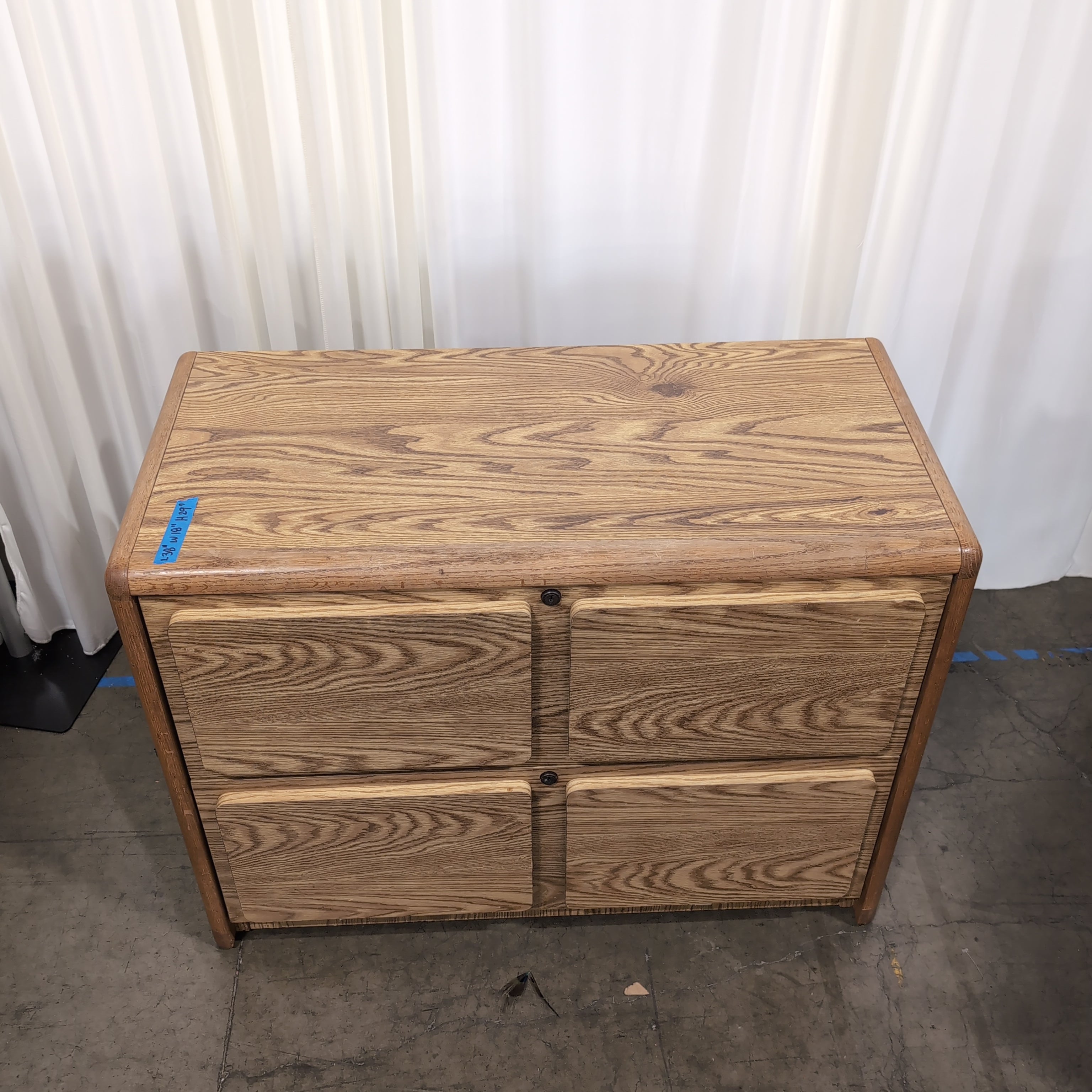 Light Oak Wood Four-Drawer Filing Cabinet