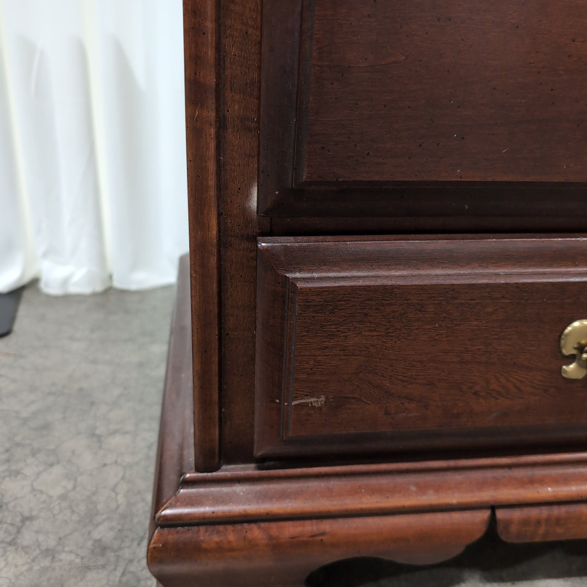 Dark Cherry Wood Nightstand with Ornate Hardware