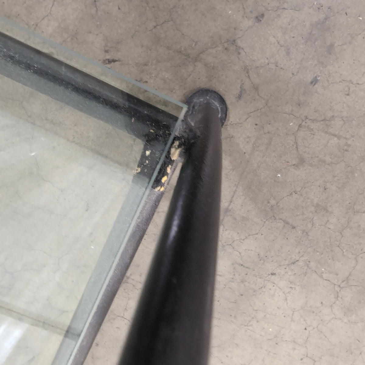 Dark Metal Two-Tiered End Table with Glass Shelves