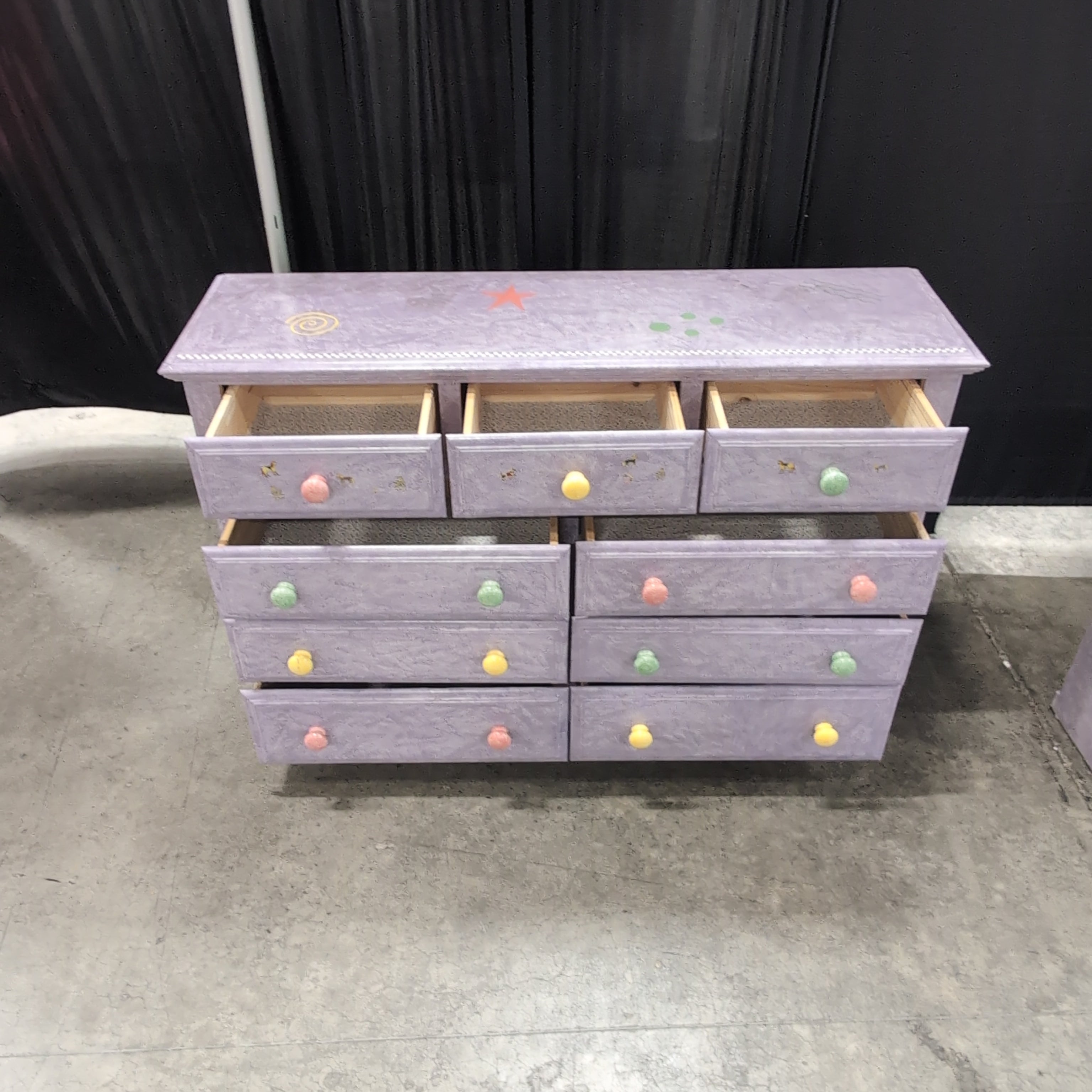 Lavender Nine-Drawer Dresser with Colorful Knobs