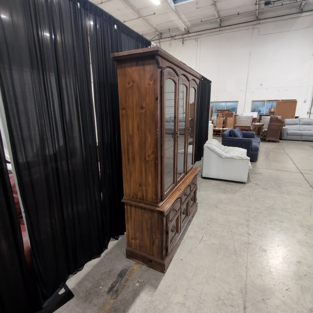 Brown Wood China Cabinet with Ornate Carvings