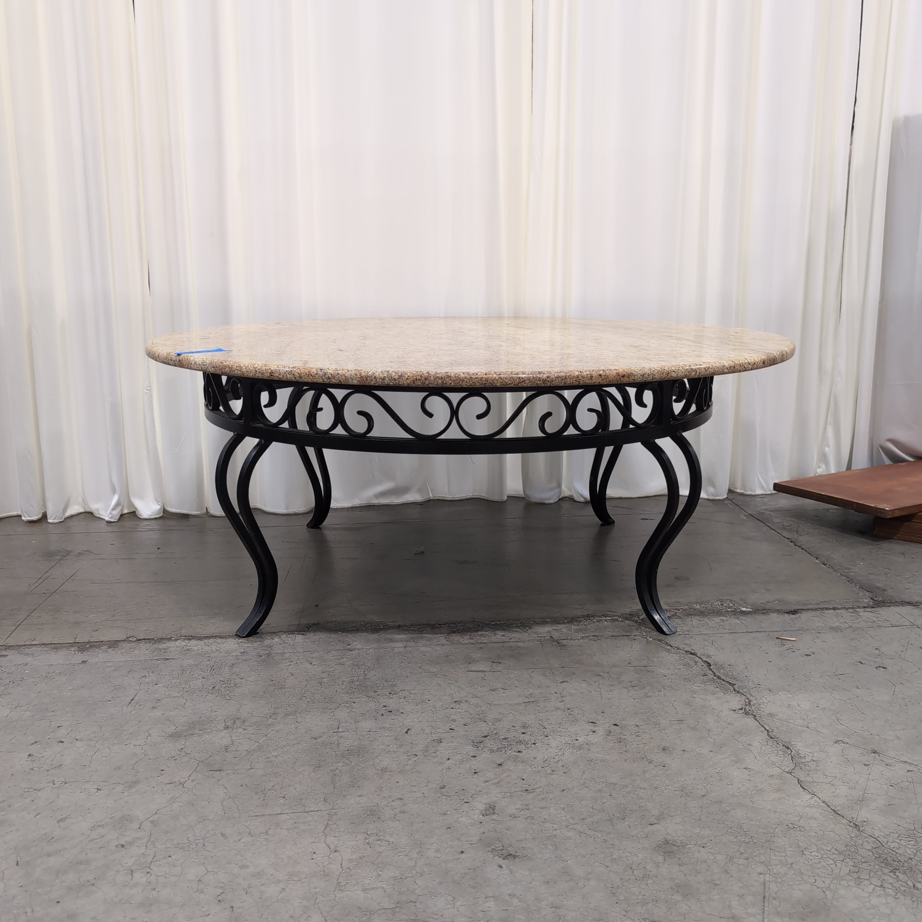 Oval Pink Speckled Granite Coffee Table with Wood Base