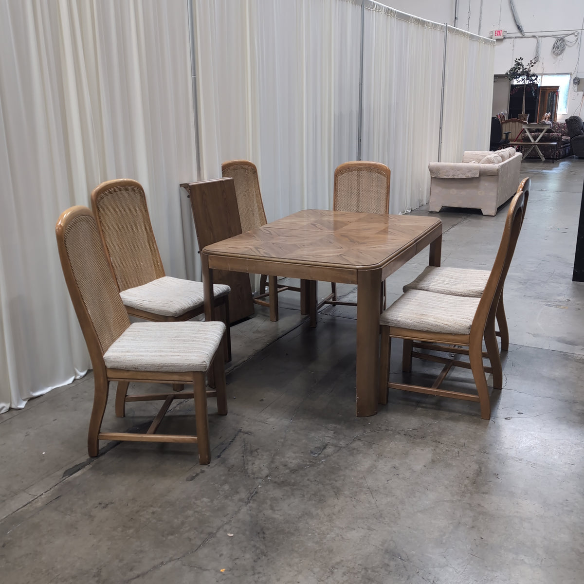 Wood Parquet Top Dining Table with Cane Back Chairs