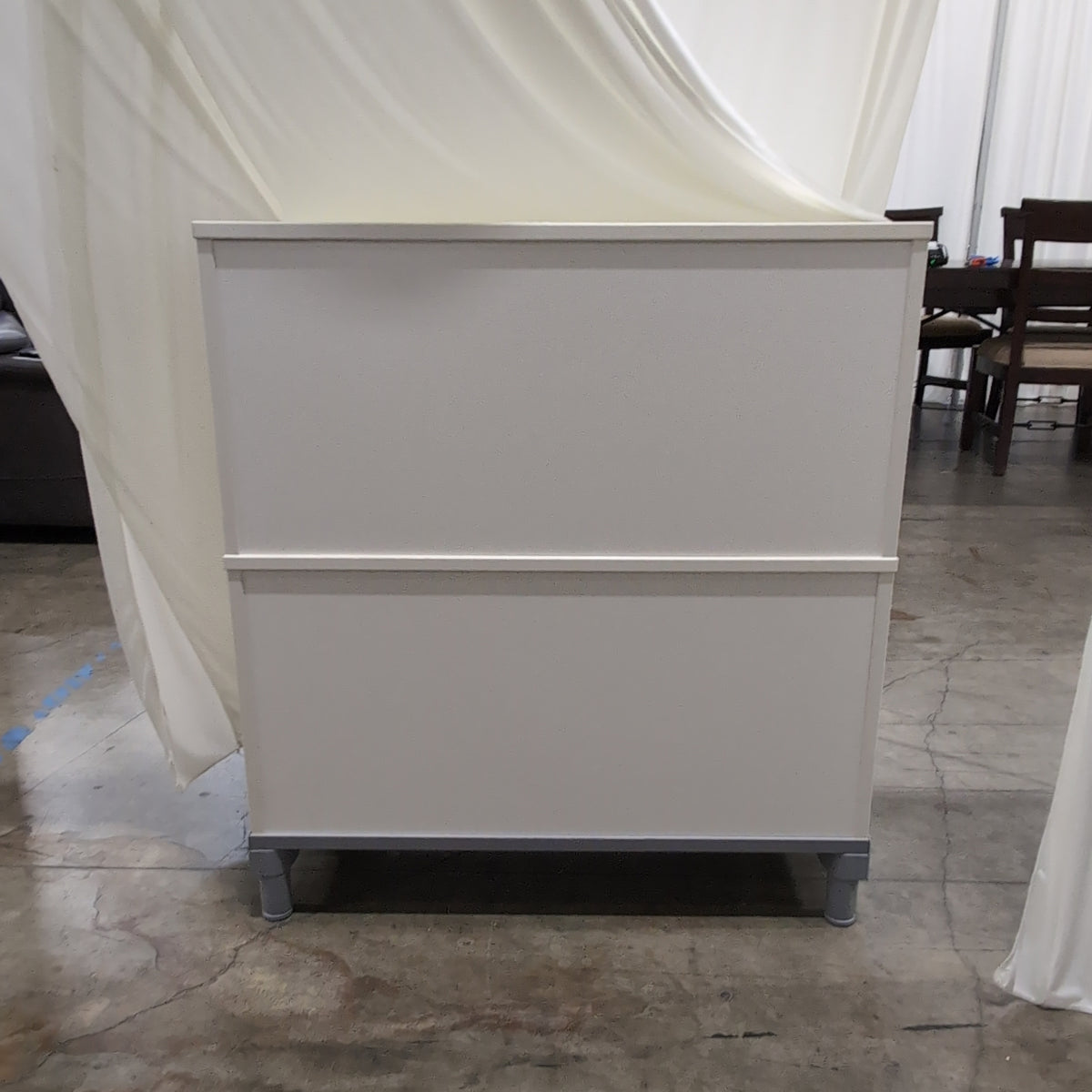 Light Gray Three-Drawer Dresser with Silver Pulls