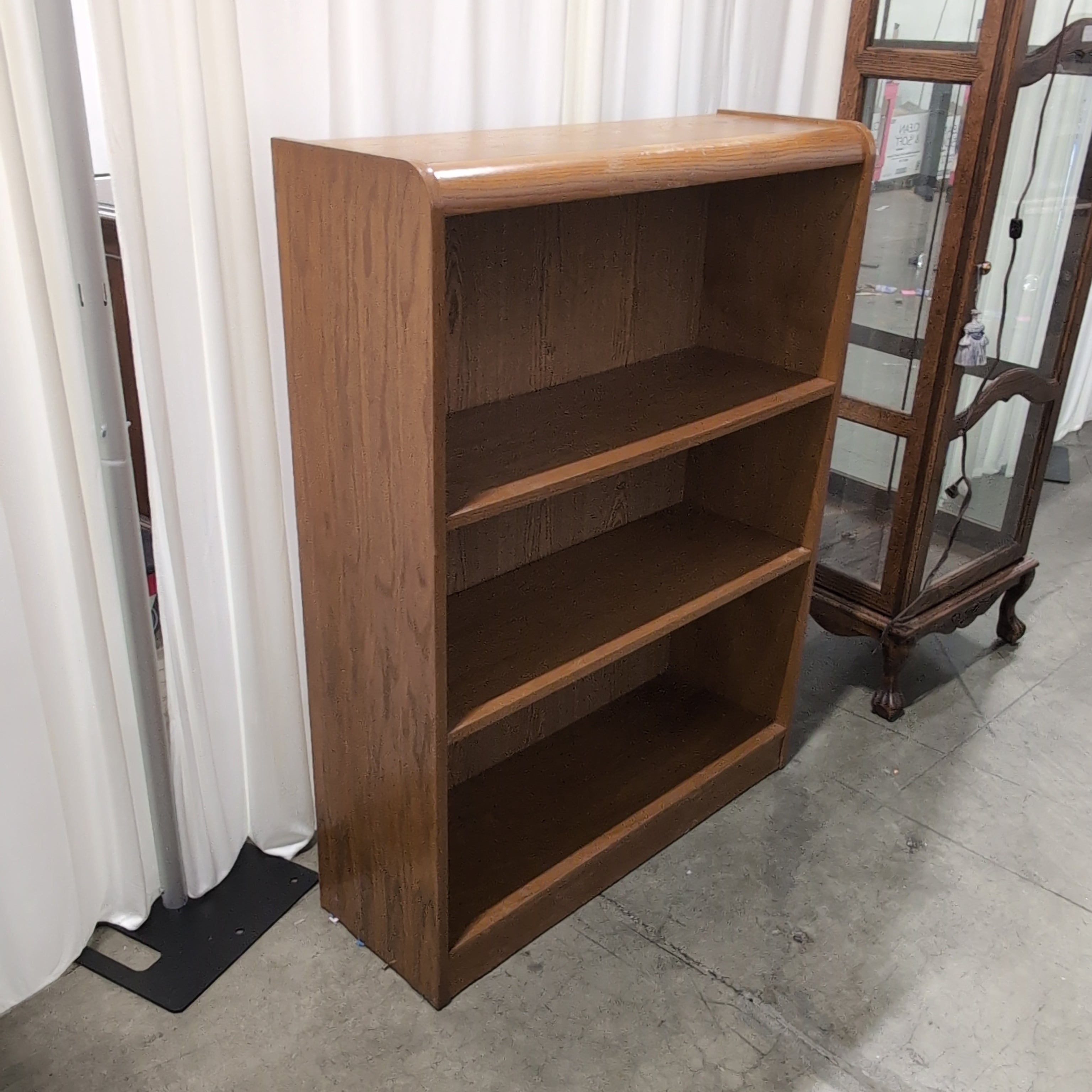 Natural Wood Four-Shelf Bookcase with Curved Sides