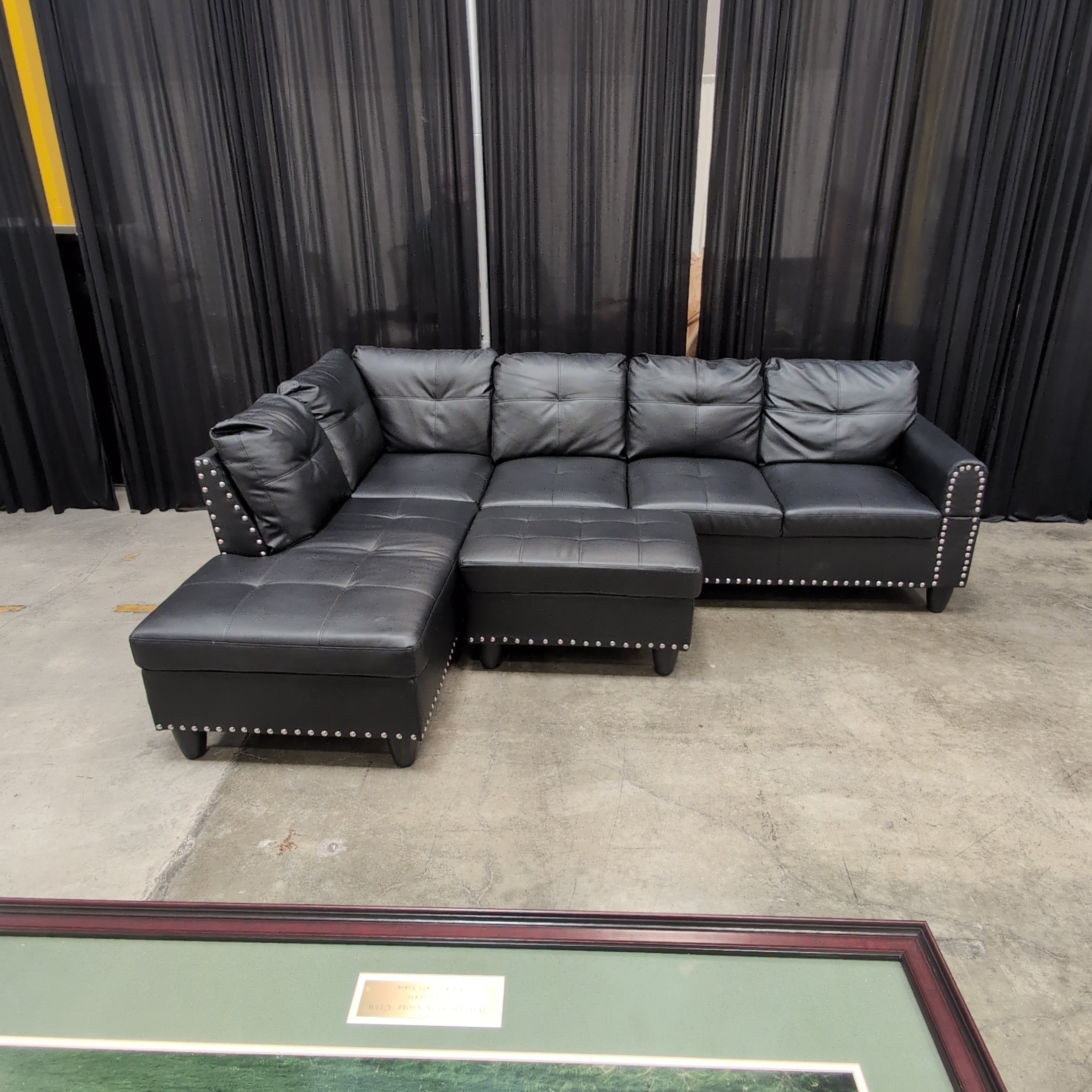 Black Faux Leather Sectional Couch with Ottoman
