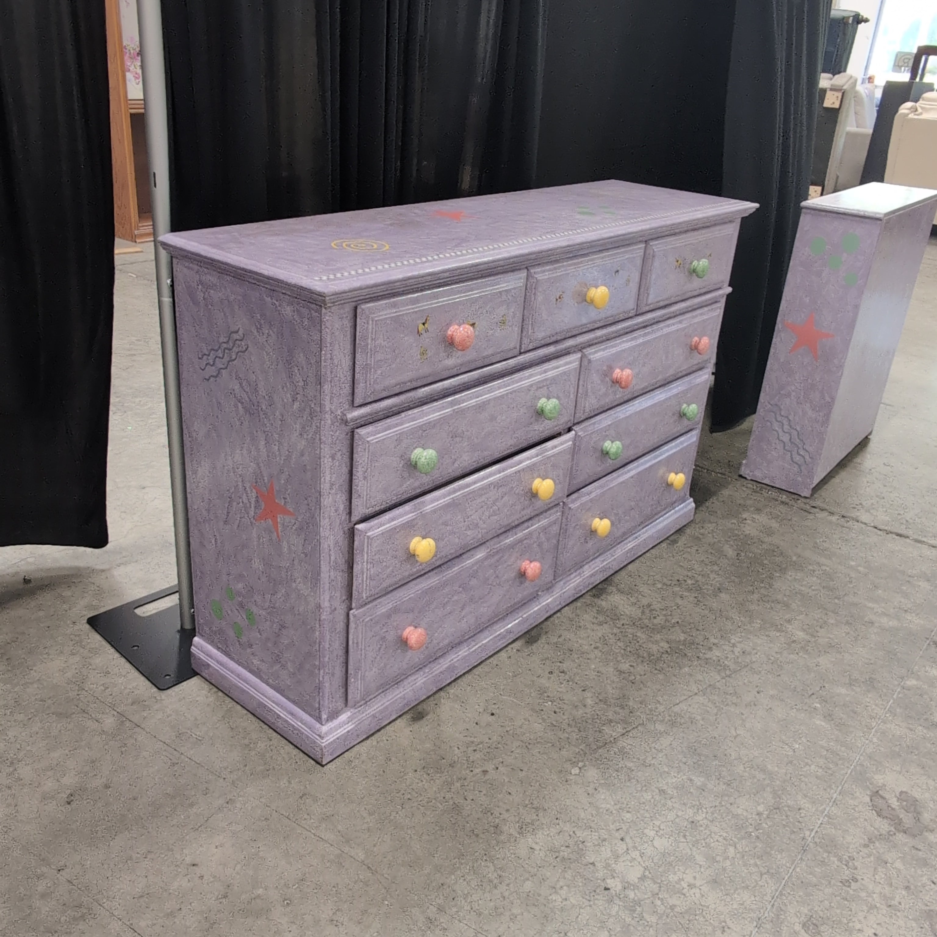 Lavender Nine-Drawer Dresser with Colorful Knobs