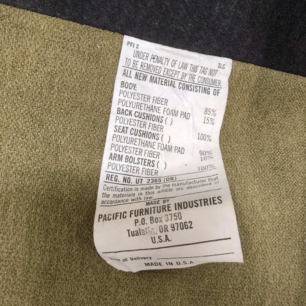 Tan Fabric Three-Cushion Couch with Rolled Arms