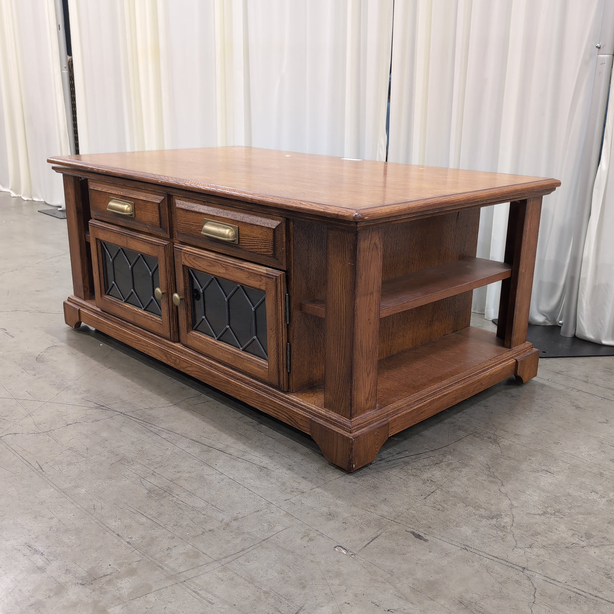 Brown Wood Coffee Table with Patterned Glass Doors