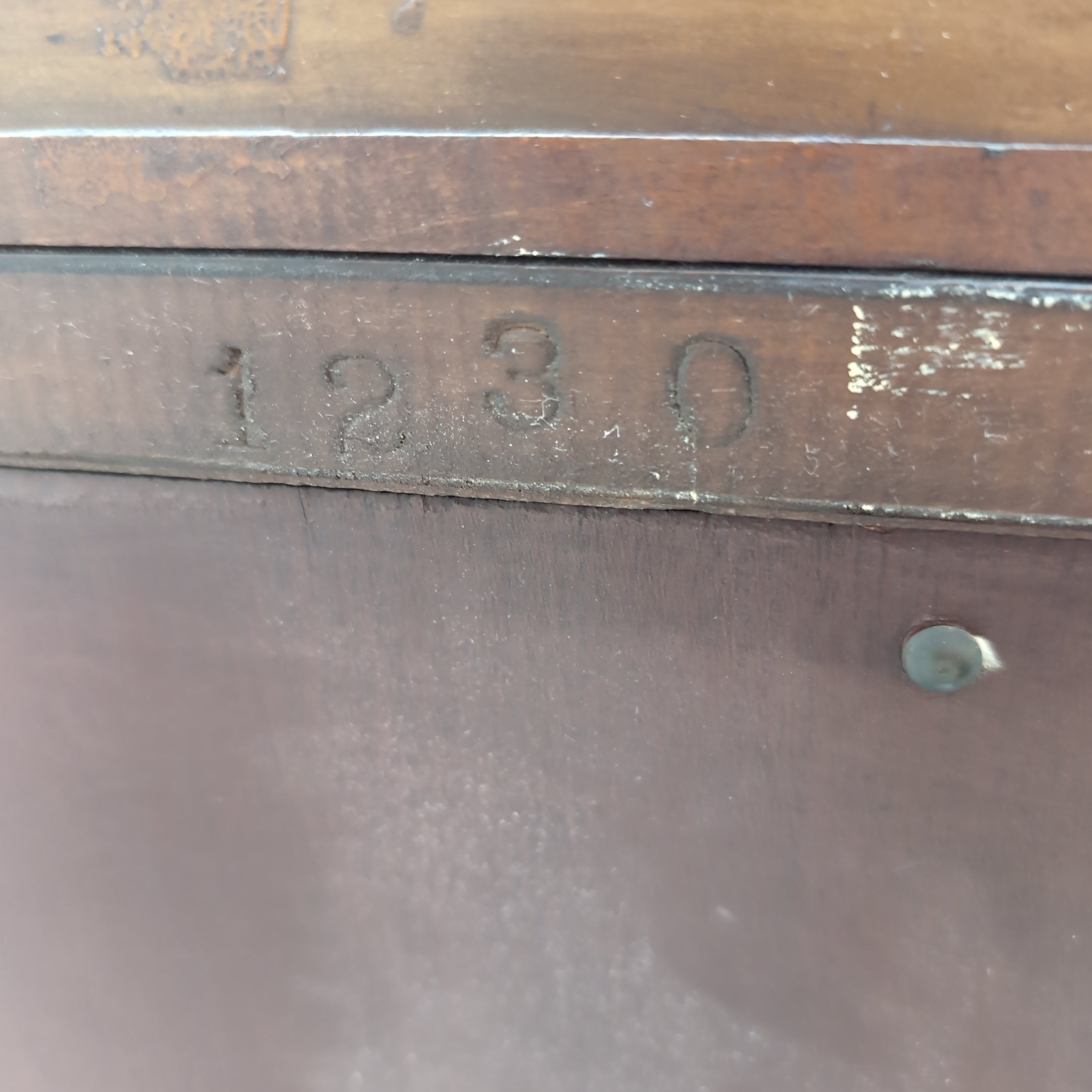 Vintage Dark Wood Four-Drawer Dresser with Ornate Carving