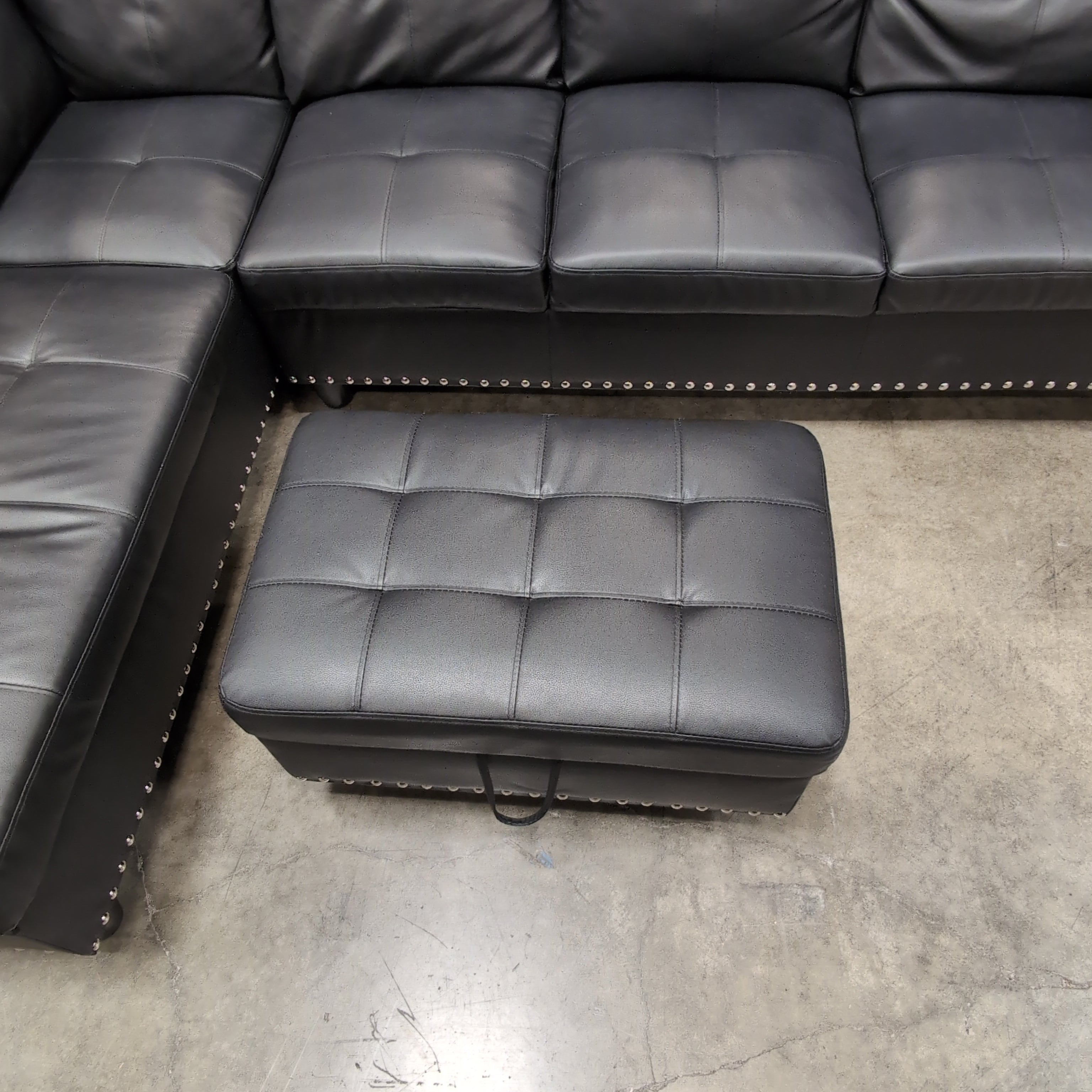Black Faux Leather Sectional Couch with Ottoman