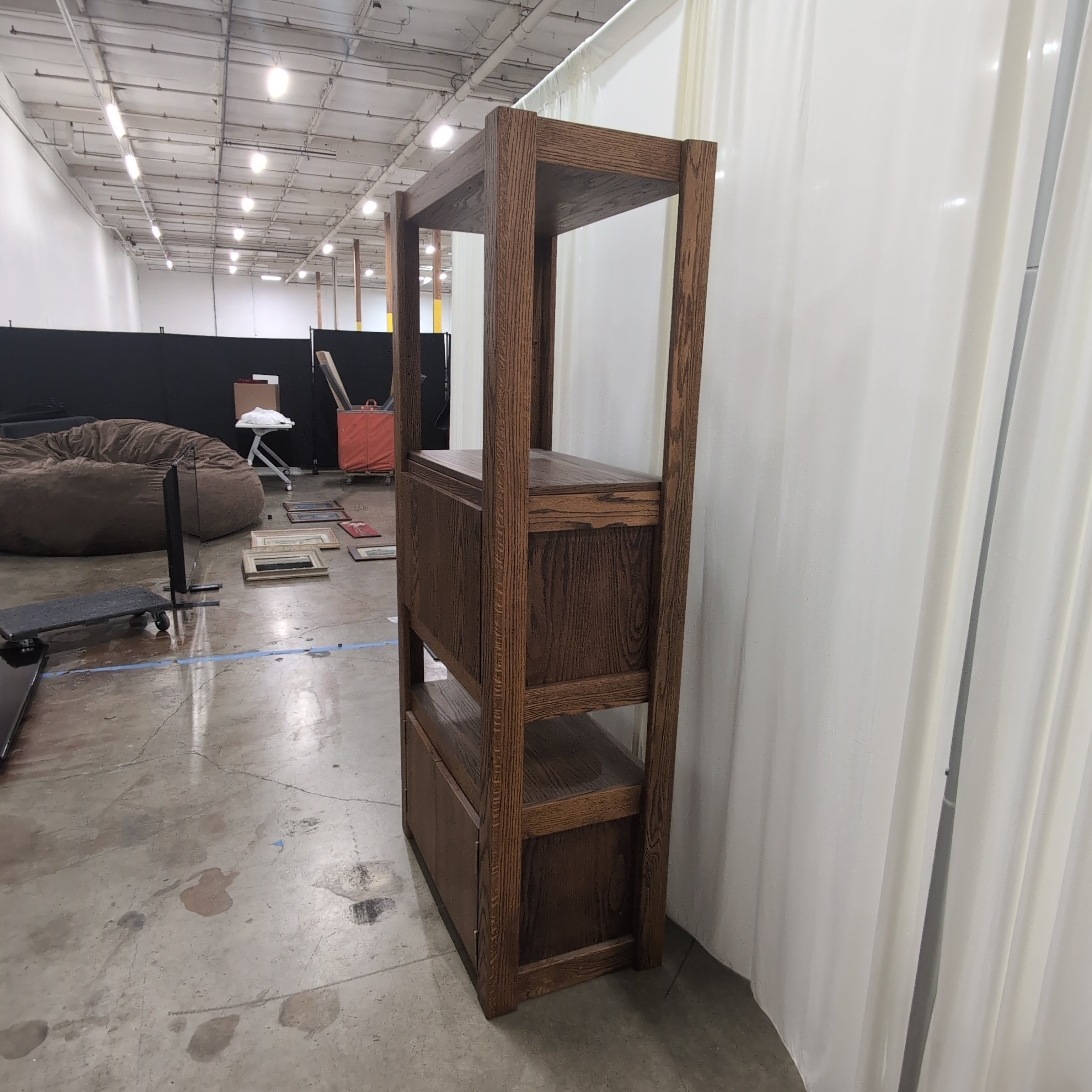 Brown Wood Ladder-Style Bookcase with Enclosed Storage