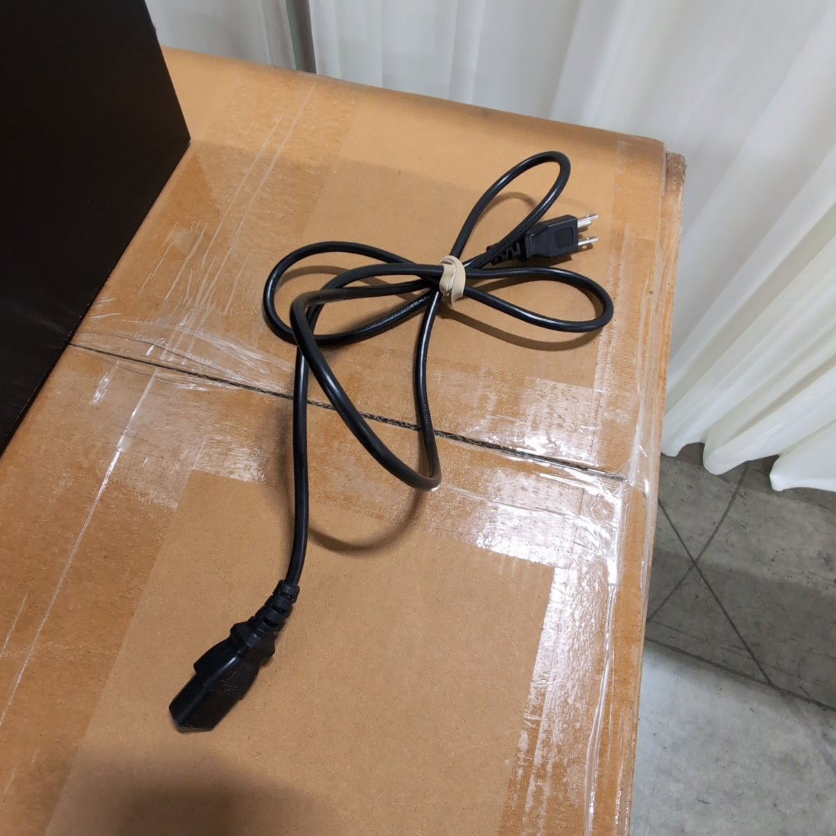 Black Desktop Computer Tower with Cables