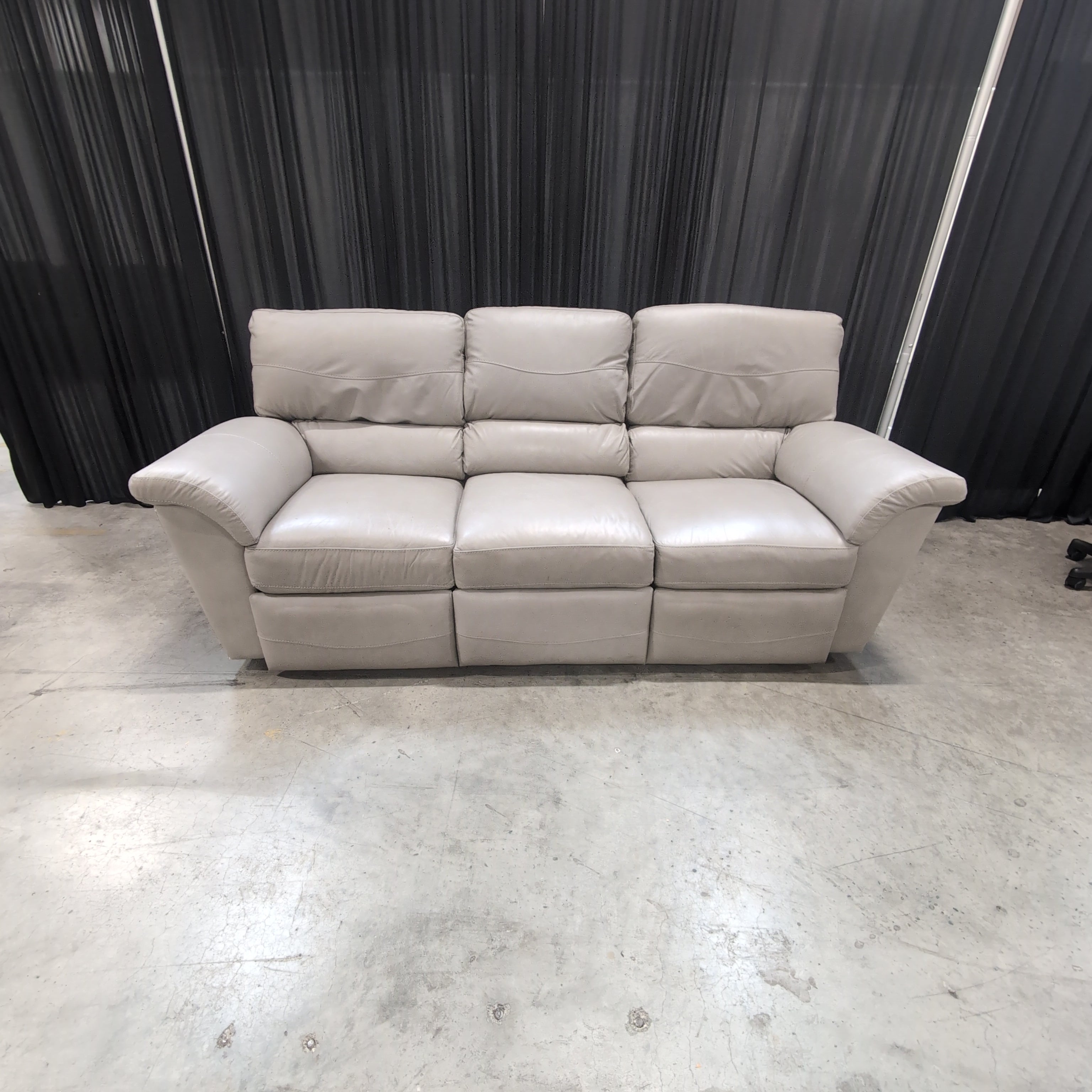Padded Beige Reclining Three-Seat Couch in Faux Leather