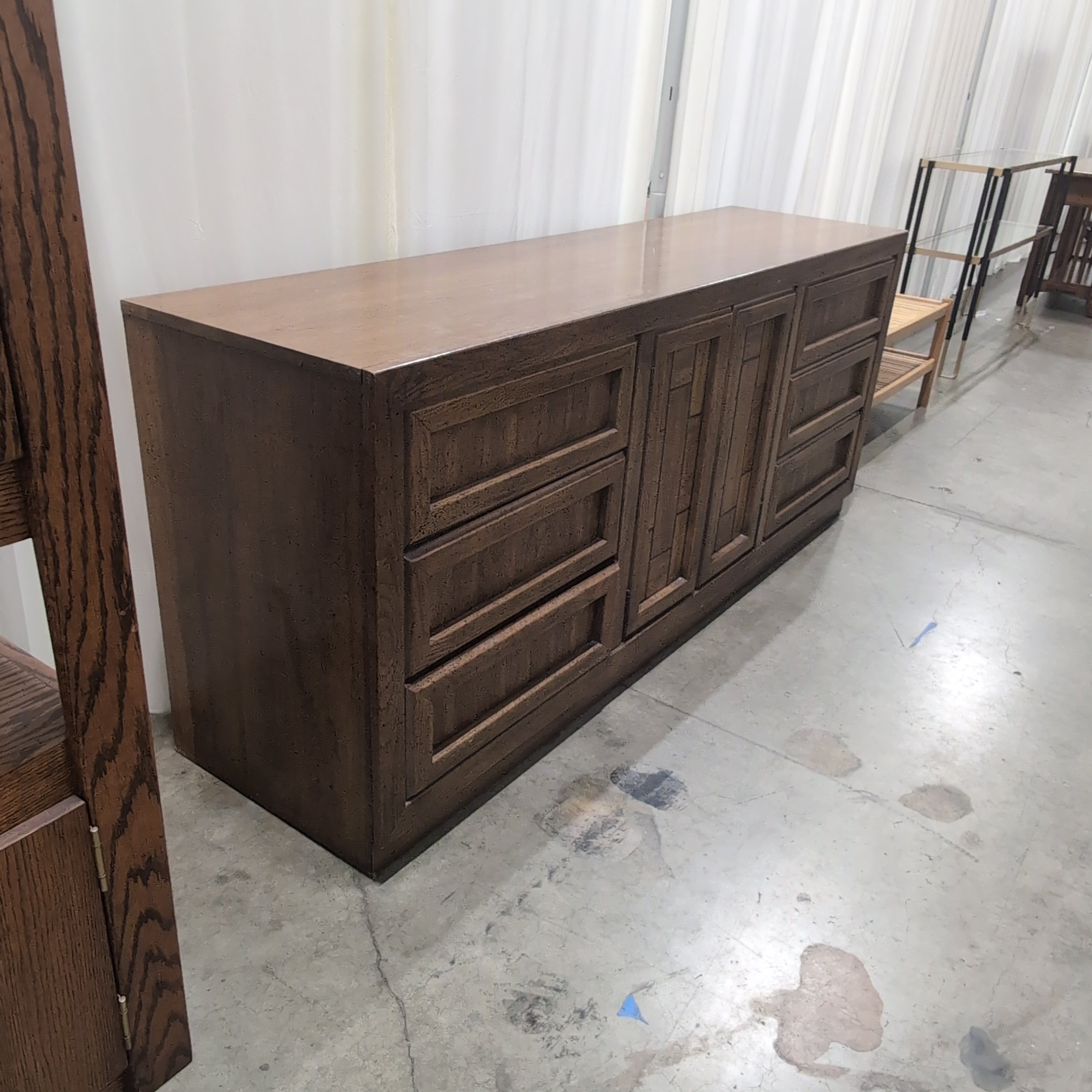Long Brown Wood Dresser with Geometric Paneling