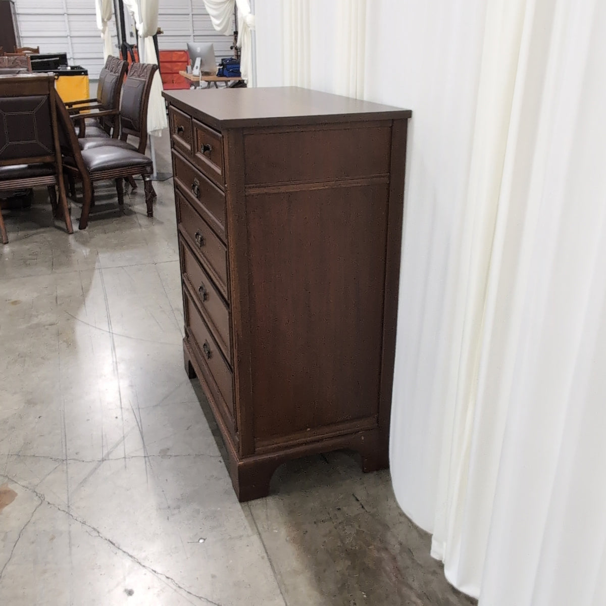 Brown Wood Six-Drawer Dresser with Ornate Hardware