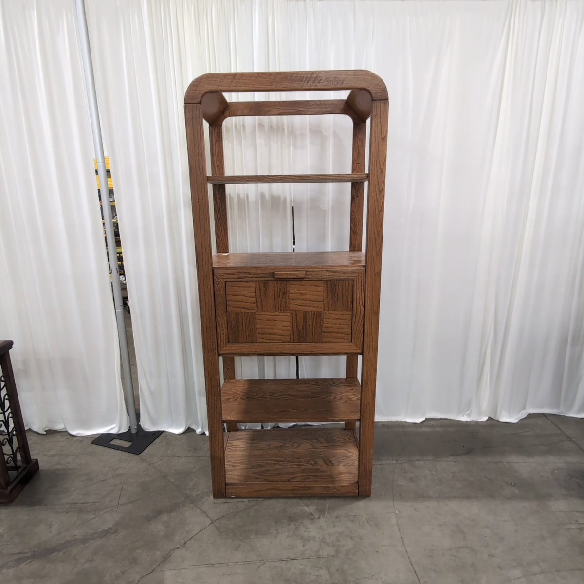 Medium Brown Wood Bookcase with Geometric Cabinet Door