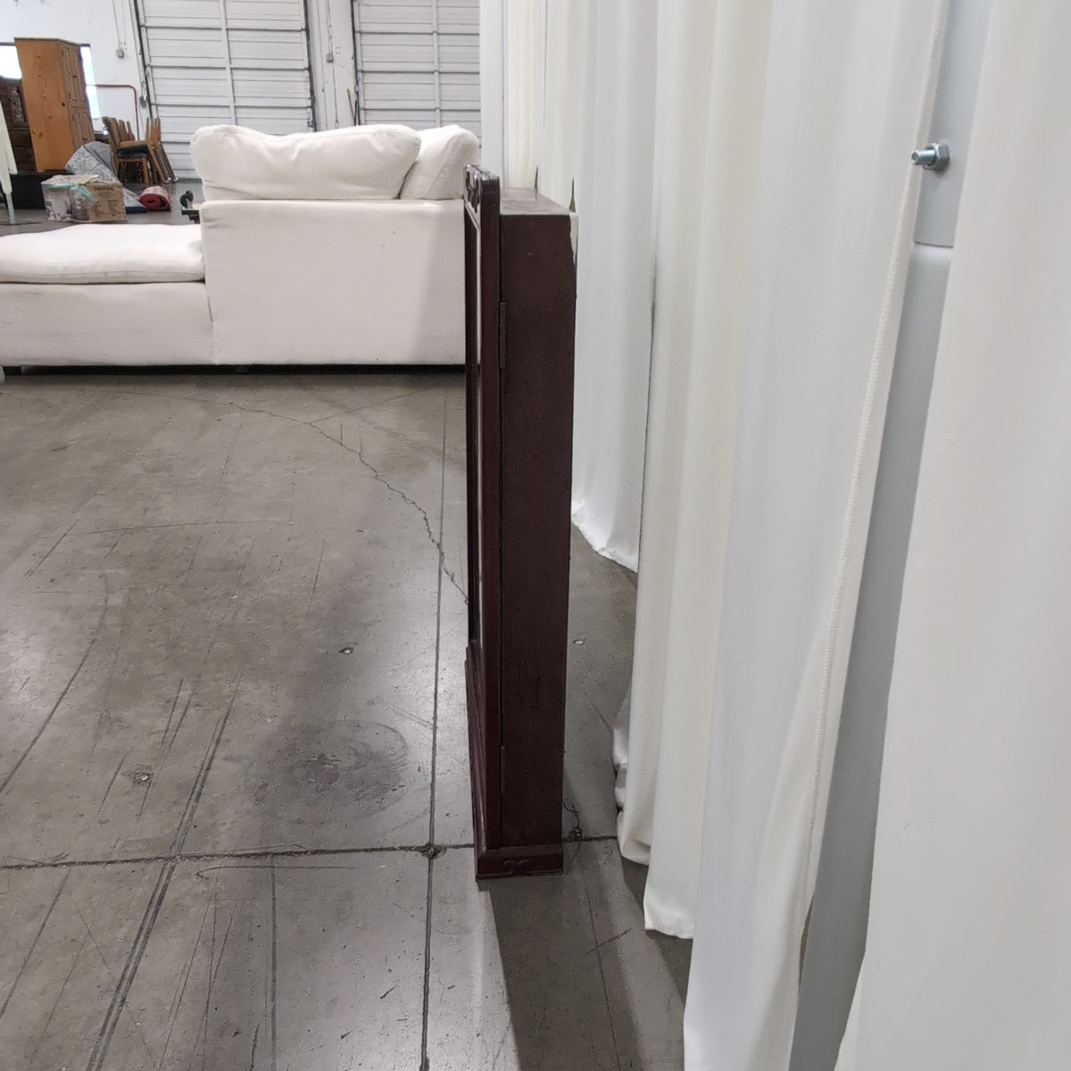 Reddish Brown Wood Display Case with Intricate Shelving