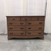 Traditional Honey Tone Nine-Drawer Dresser with Ornate Hardware