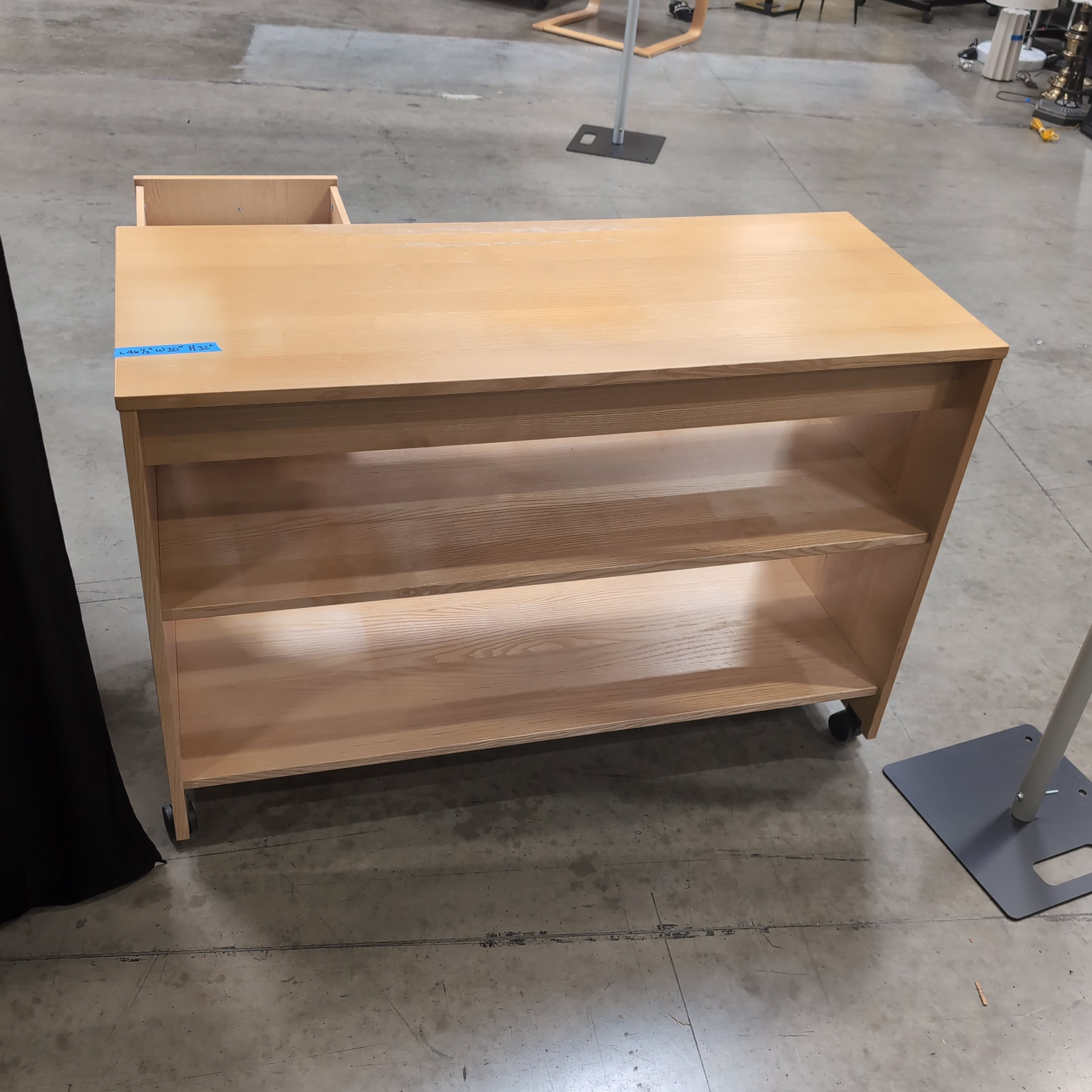 Light Wood Three-Shelf Bookcase with Casters