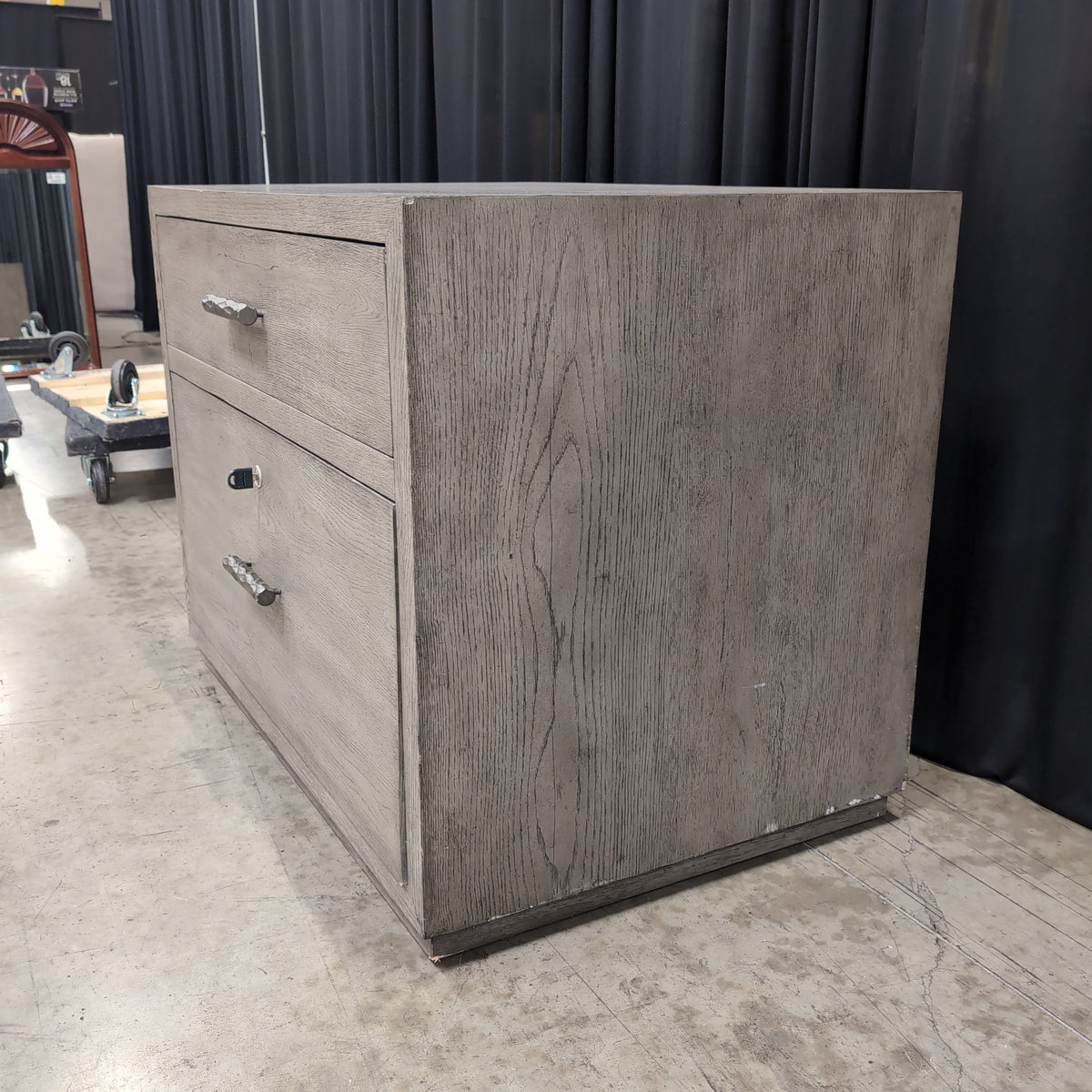 Light Wood Two-Drawer Nightstand with Textured Hardware