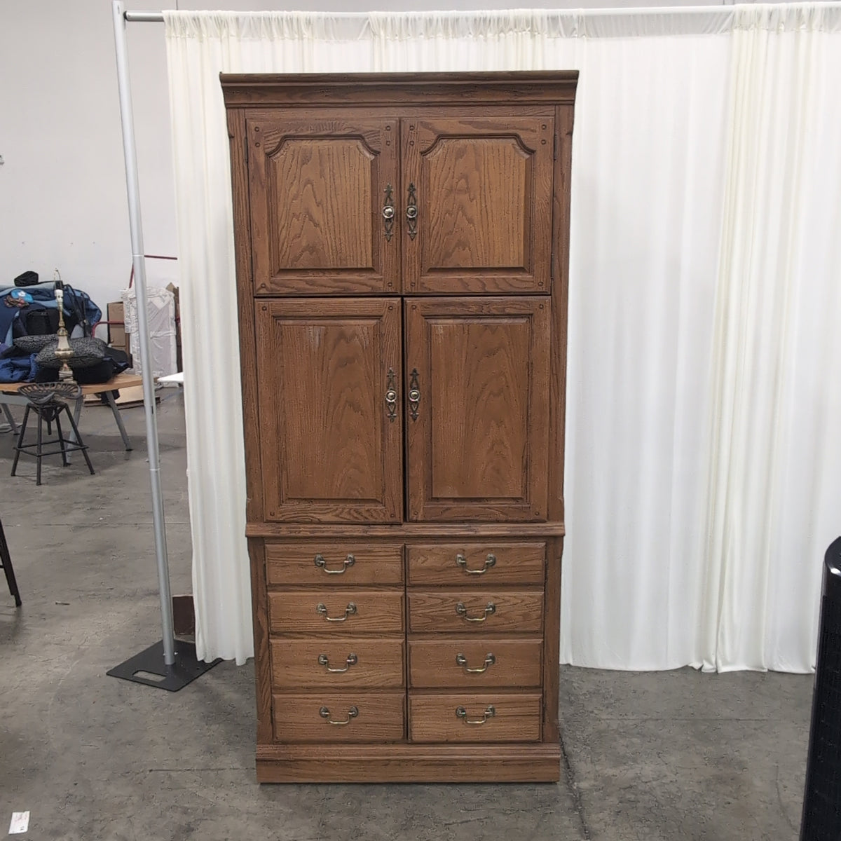 Medium Brown Wood Armoire with Ornate Hardware