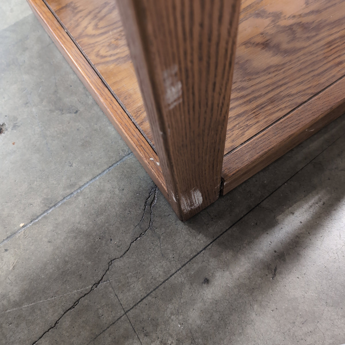 Medium Brown Wood Bookcase with Geometric Cabinet Door