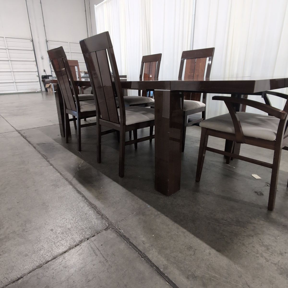 Chestnut brown dining table with 6 matching chairs